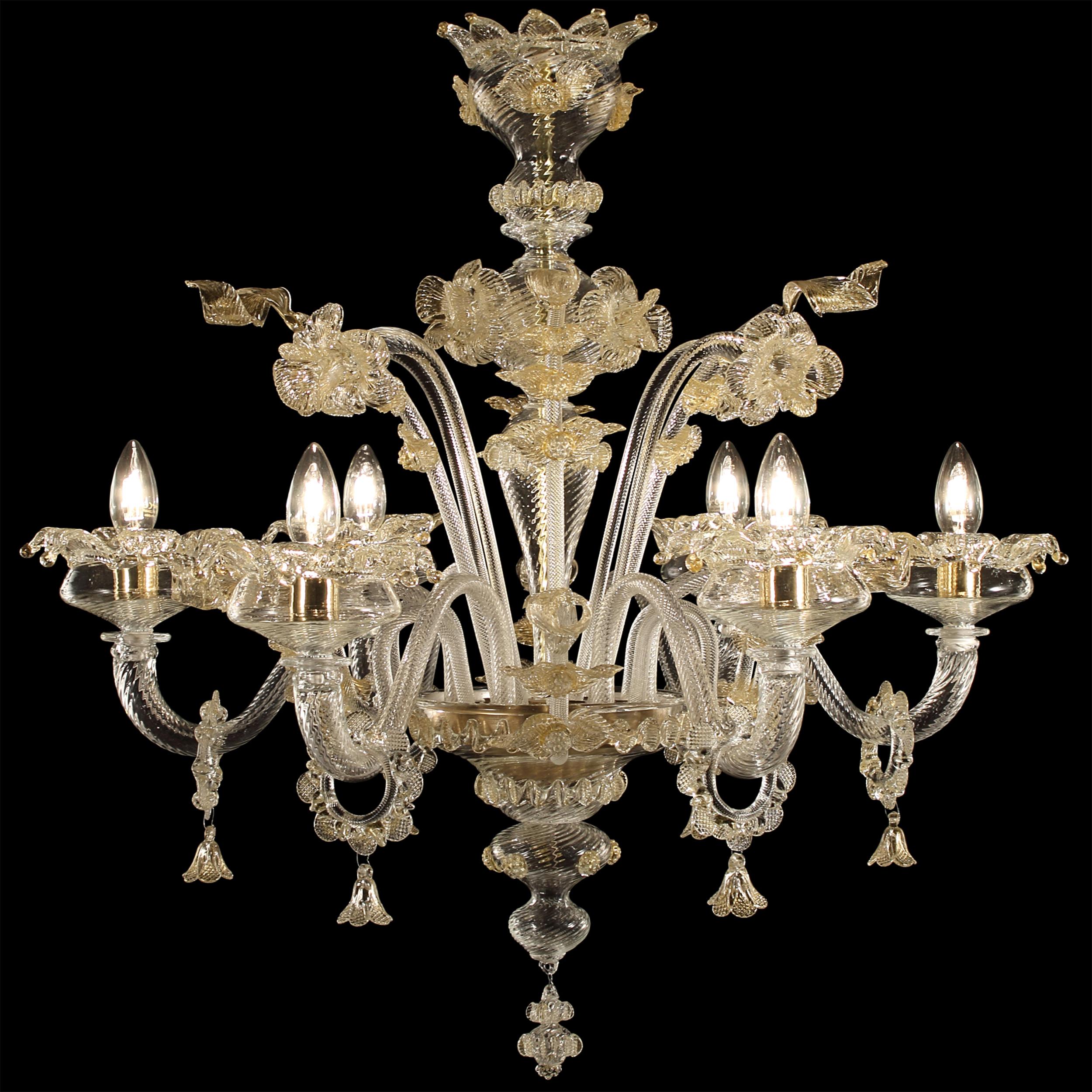 Rich chandelier 6 Arms crystal and gold Murano glass Fenix by Multiforme.
The blown glass chandelier Fenix, with its floral style, harks back to the venetian classic tradition. The decorative elements are characterized by flowers modelled petal by
