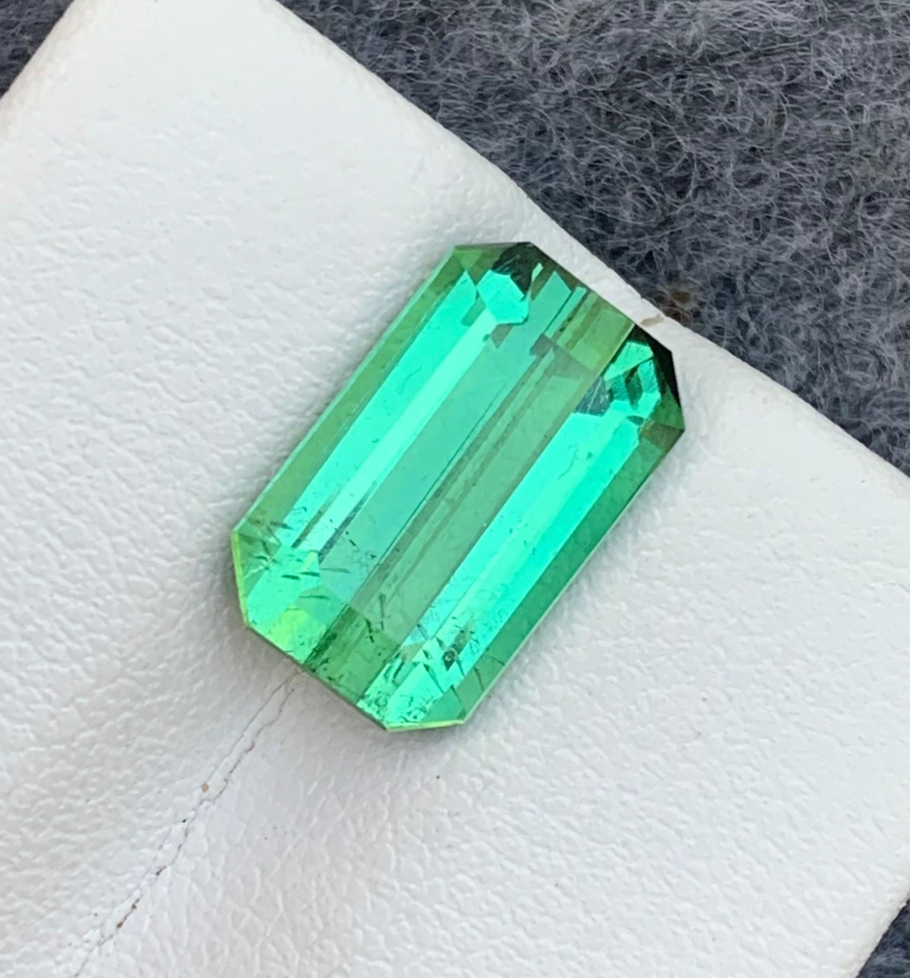 Faceted Tourmaline
Weight: 5.70 Carats
Dimension: 13.2x8.2x5.8 Mm
Origin: Kunar Afghanistan Mine
Shape: Emerald 
Color: Green
Quality: SI
Certificate: On Demand
Green Tourmaline moves healing energy throughout the body, bringing a sense of vitality