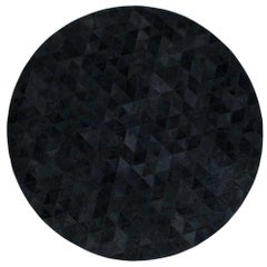 Petit tapis rond personnalisable Trilogia en cuir de vache anthracite, petit modèle