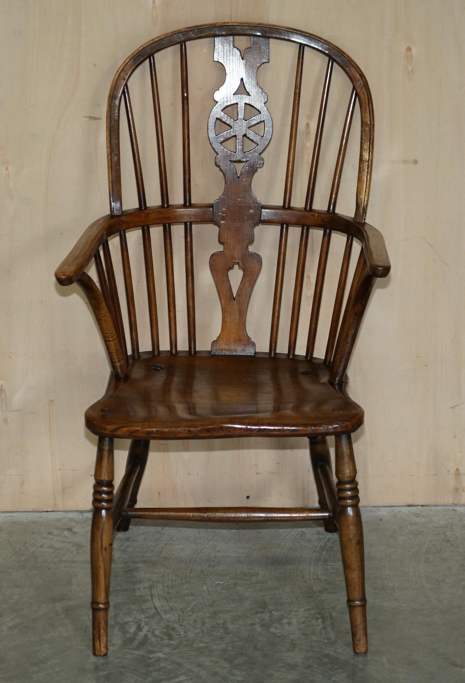 We are delighted to offer for sale this stunning early 19th century English classic antique Elm hoop back west country Windsor armchair

A highly coveted, well made and decorative armchair, in the traditional Elm, this is an early hoop back