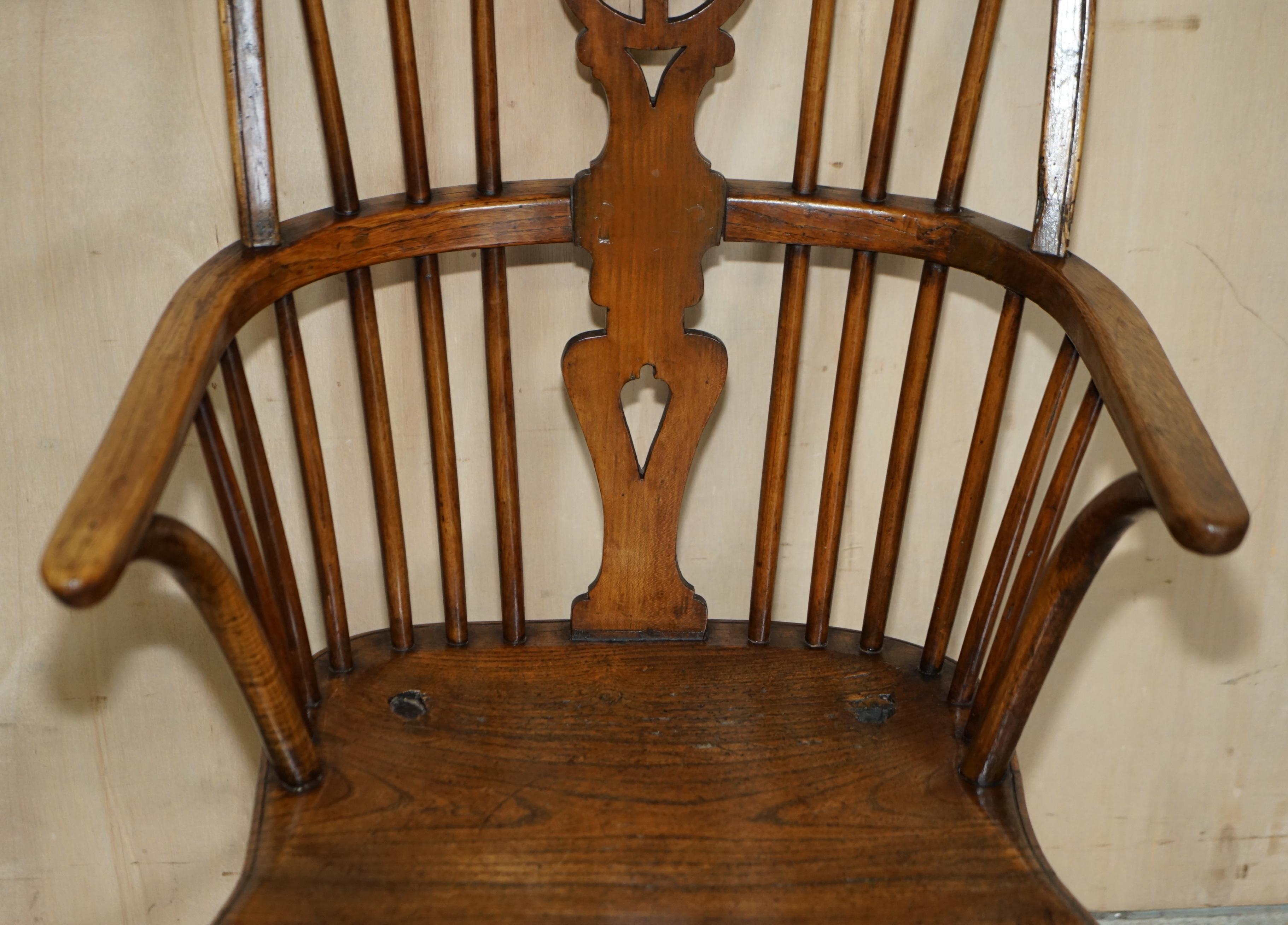 Hand-Crafted Rich Colour Antique 19th Century Elm Wheel Back West Country Windsor Armchair For Sale