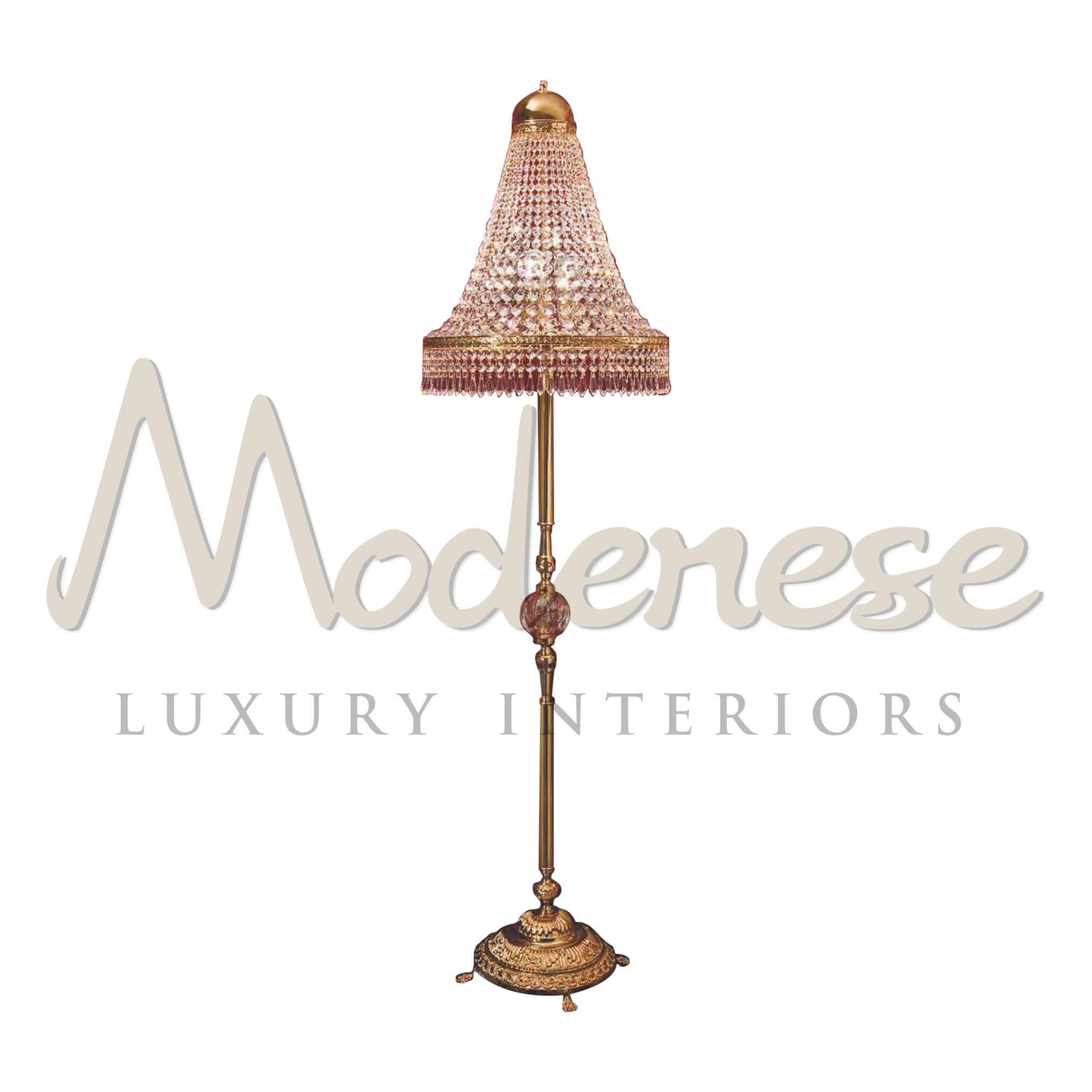 This Modenese Luxury Interiors 3 light stand floor lamp combines elegance and richness. Handcrafted brass base is finished in 24kt gold plate and crowned with scholer crystals which add a beautiful accent. This model requires 3 single E14 screw fit