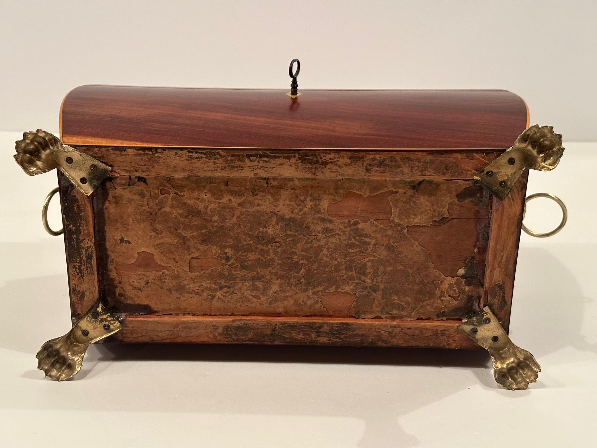 Rich Mahogany Regency Style Tea Caddie with Inlay and Brass Lion Rings In Good Condition For Sale In Hopewell, NJ