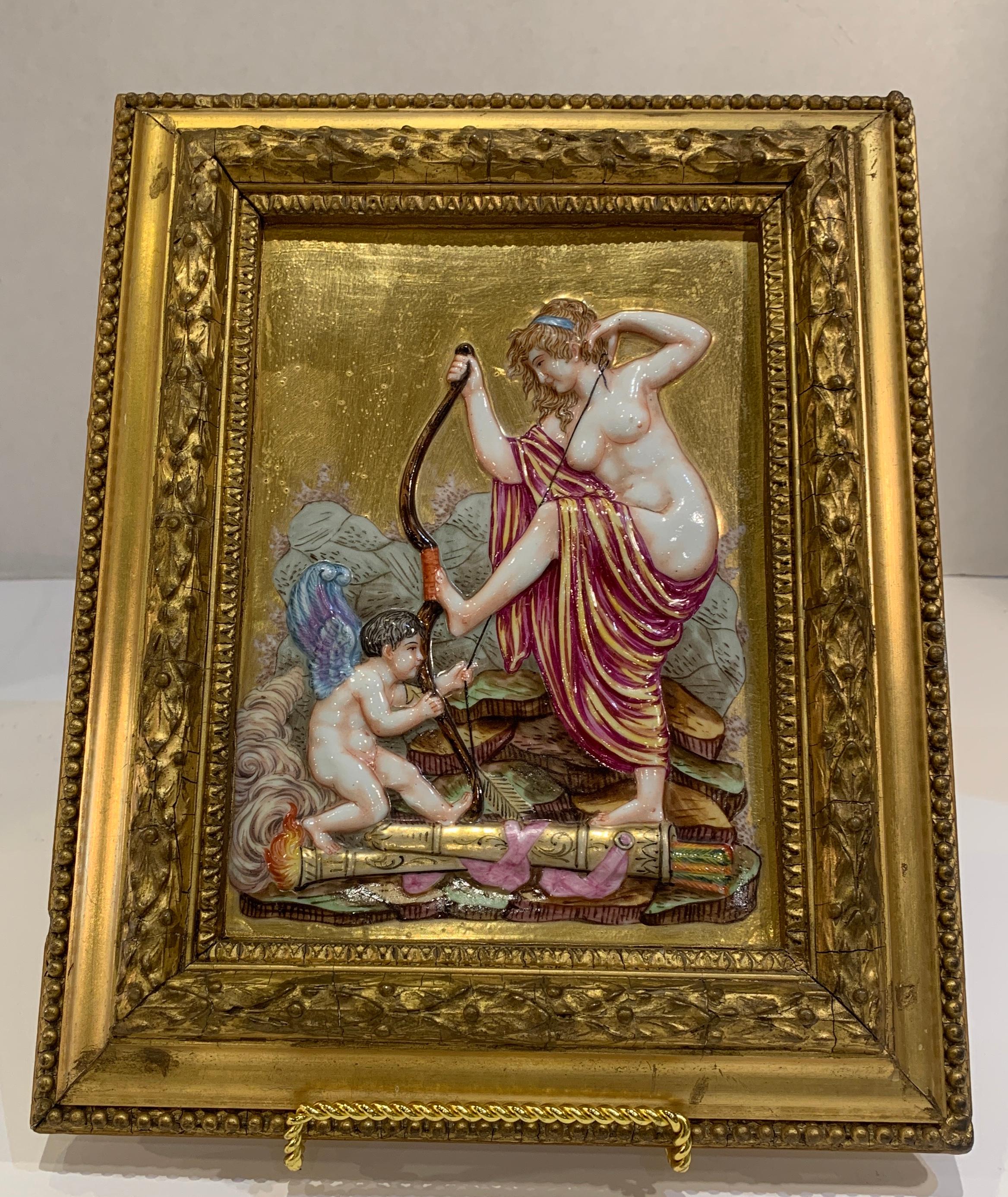 Opulent, antique, handmade, superbly hand painted Capodimonte porcelain plaques from the nineteenth century depict ancient mythological scenes, with cherubs and nymphs. The plaques are cast in exquisitely detailed high relief with lush and subtly
