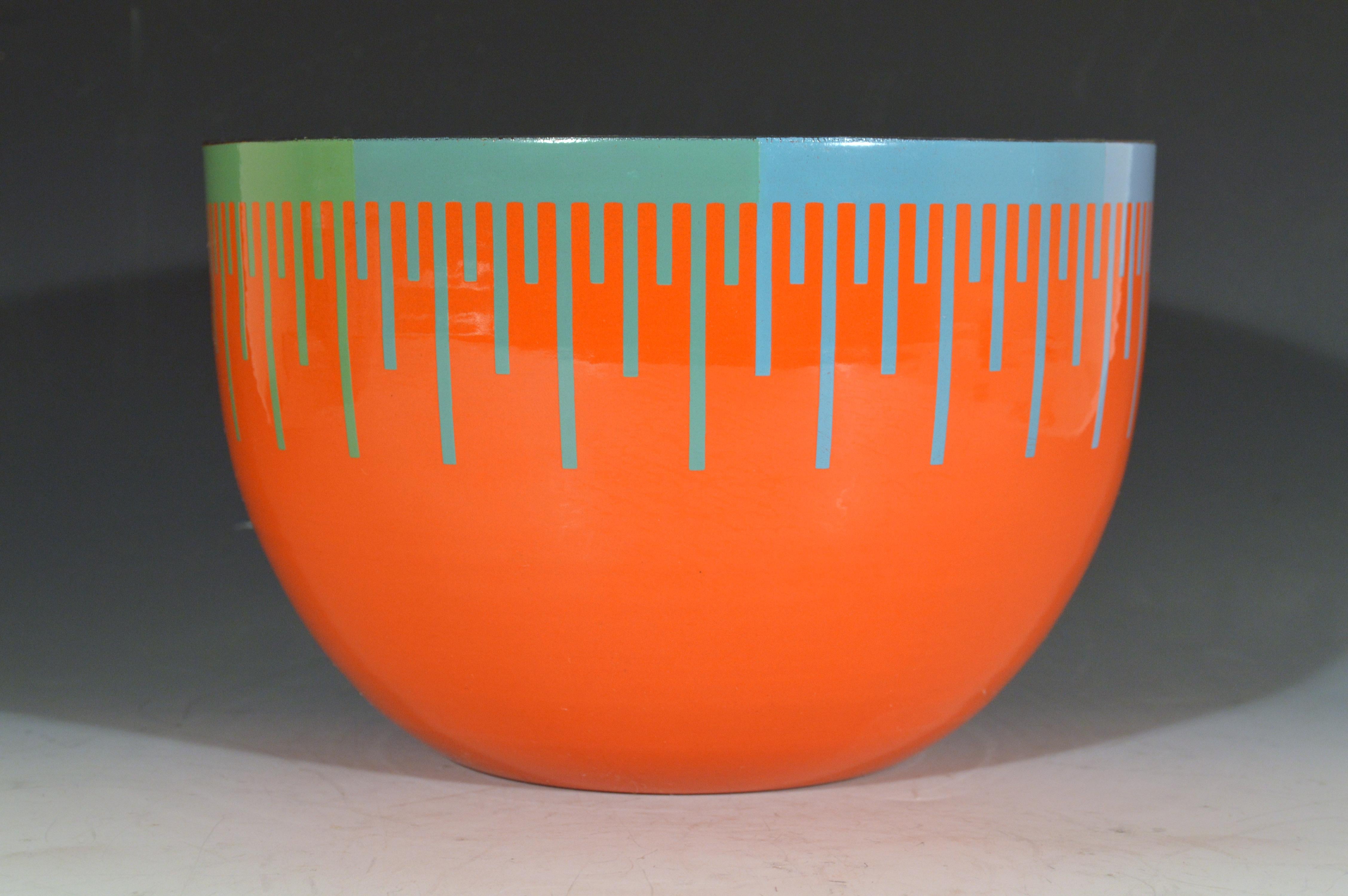 Rare Richard Anuszkiewicz Op Art enamel bowl
Made for the Hirshhorn Museum and Sculpture Garden, Smithsonian Institute, Washington D.C. 
1976

A deep, orange-ground exterior enamel on metal bowl with variations of blues and greens around the rim