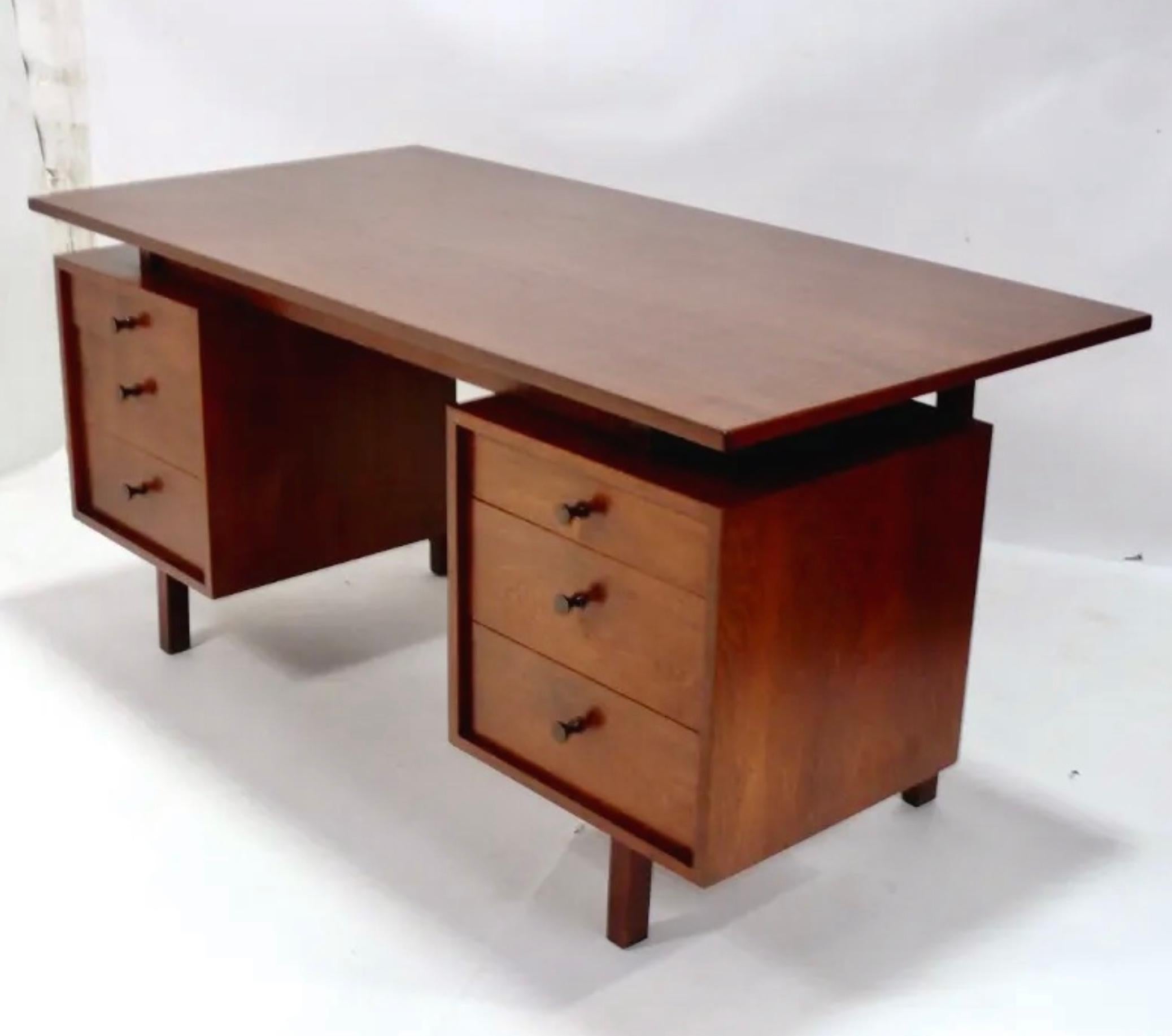 Clean Lined Mid Century desk, designed by Richard Artschwager, American, circa 1960s.nHand signed under drawer. It is finished on both sides, so it could be floated in a room. Desk measures 29