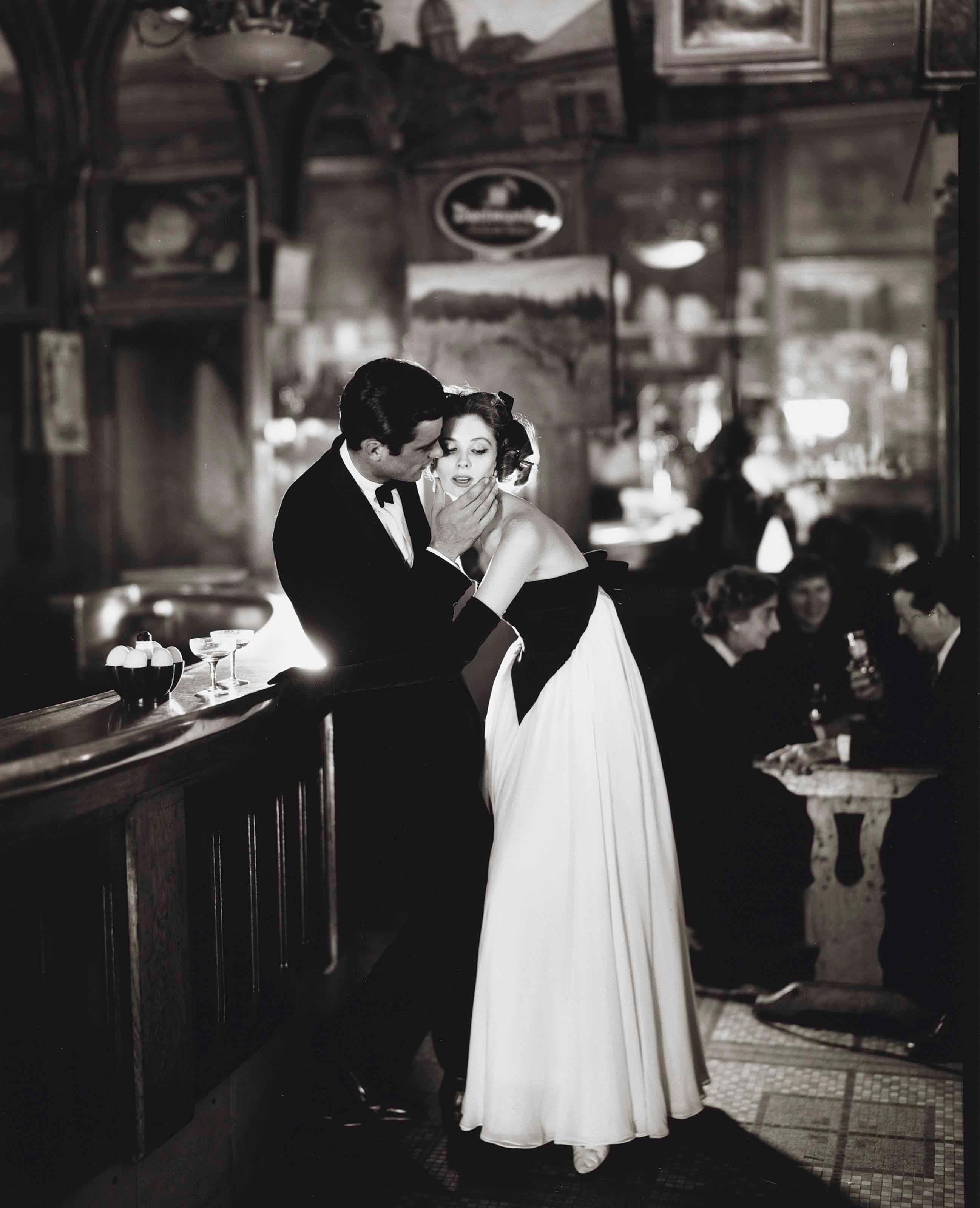 Richard Avedon Figurative Photograph - Suzy Parker & Gardner McKay, Dress by Balmain, Café des Beaux-Arts, Paris, 1956