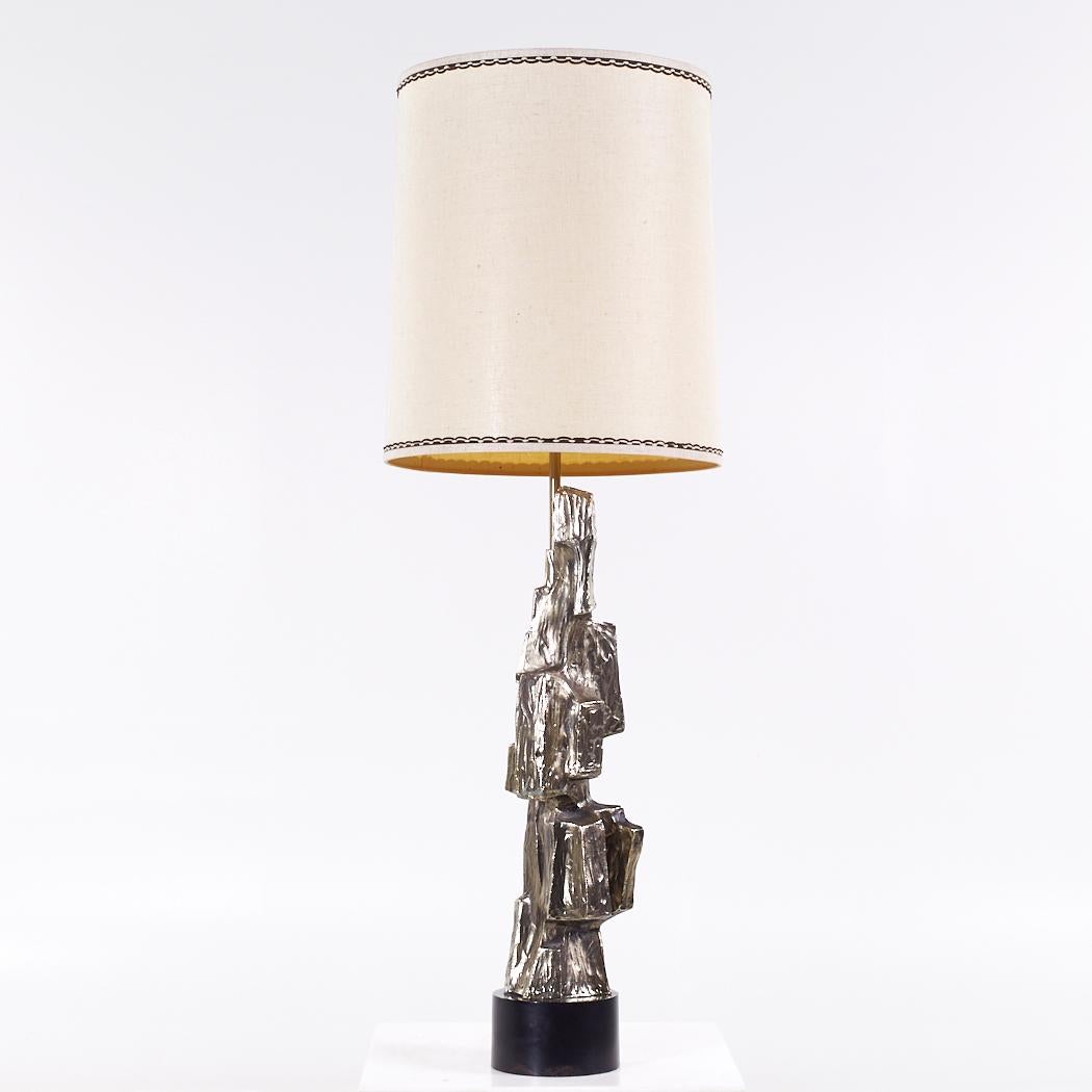 Richard Barr for Laurel Brutalist Mid Century Lamp

This lamp measures: 18 wide x 18 deep x 53.5 inches high

We take our photos in a controlled lighting studio to show as much detail as possible. We do not photoshop out blemishes. 

We keep you