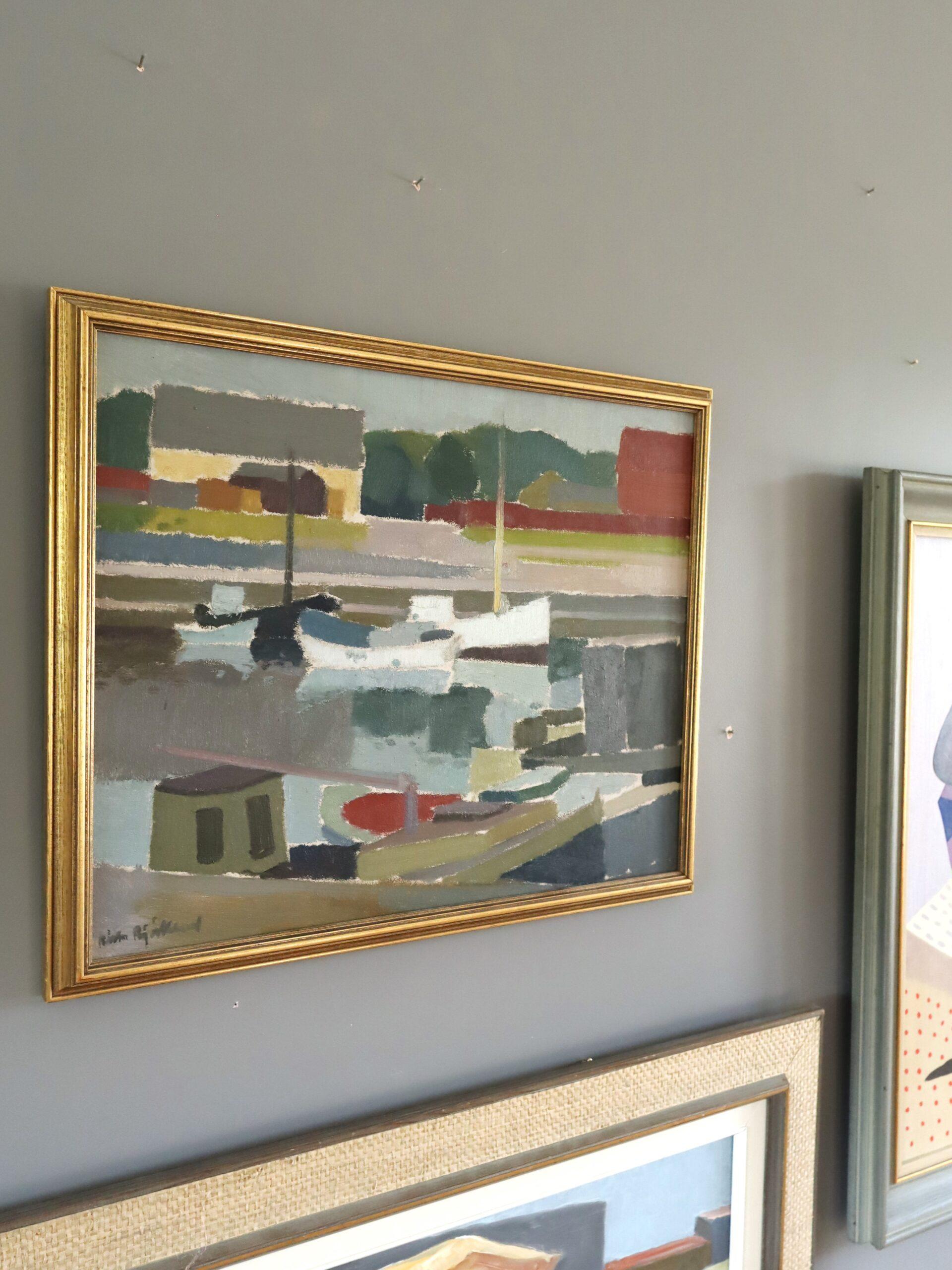 HARBOUR REFLECTIONS
Size: 36 x 44 cm (including frame)
Oil on board

A mid-century modernist harbour scene that presents a distilled, geometric interpretation of a working waterfront, painted in oil onto board by the established Swedish artist