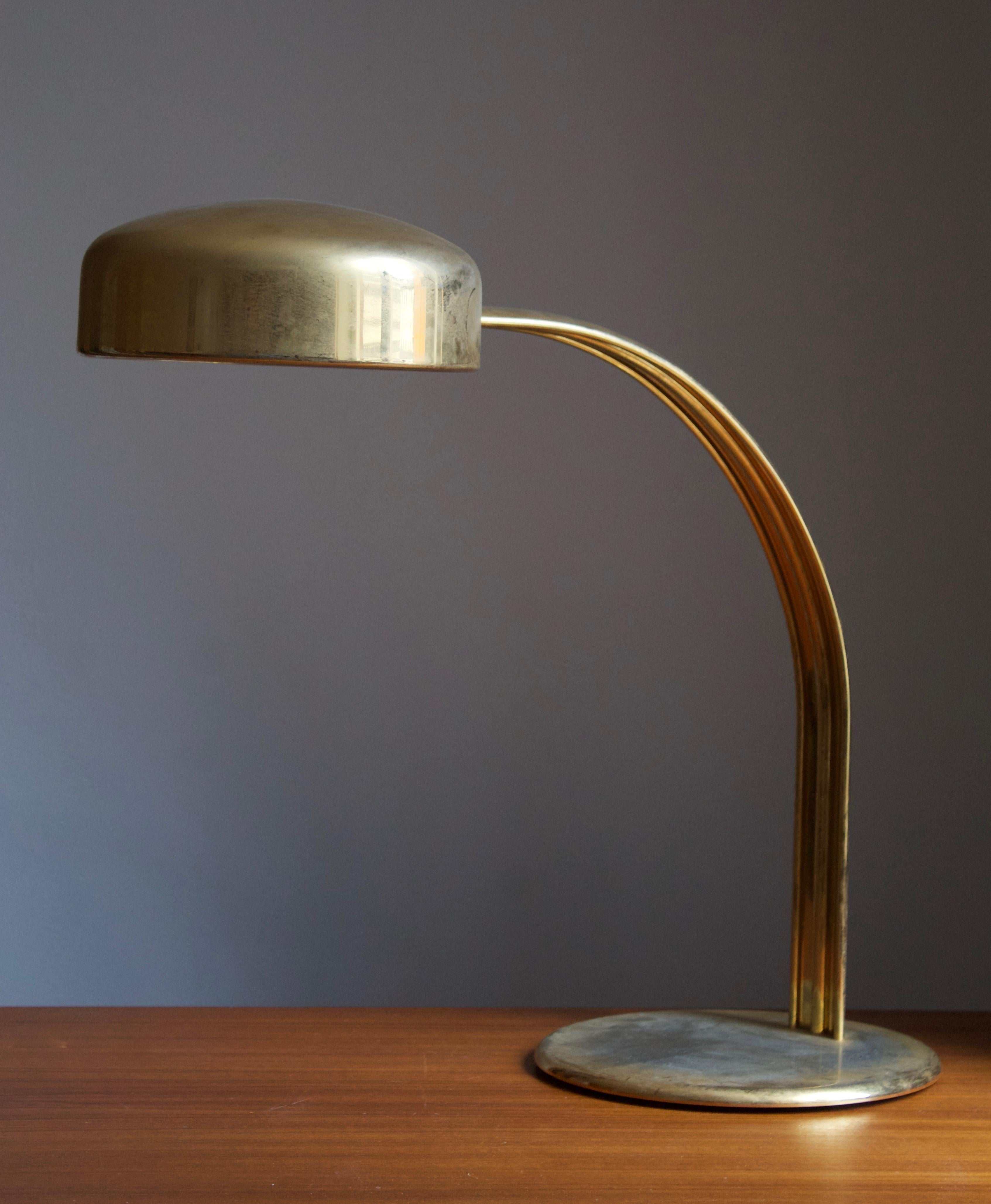 A sizable table lamp, designed by Richard Carruthers for Atelje Lyktan, Sweden, 1960s.

In brass.