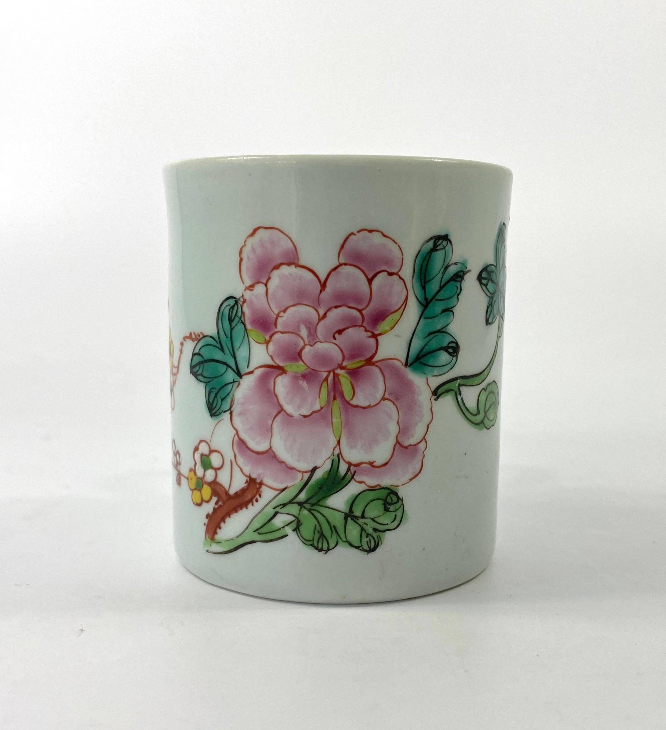 SOLD
Richard Chaffers porcelain coffee can, c. 1758. Beautifully hand painted in vibrant enamels, with a flowering plants, in Chinese famille rose style. Having a simple loop handle, and an unglazed base.
Having a very distinct green tinge to the