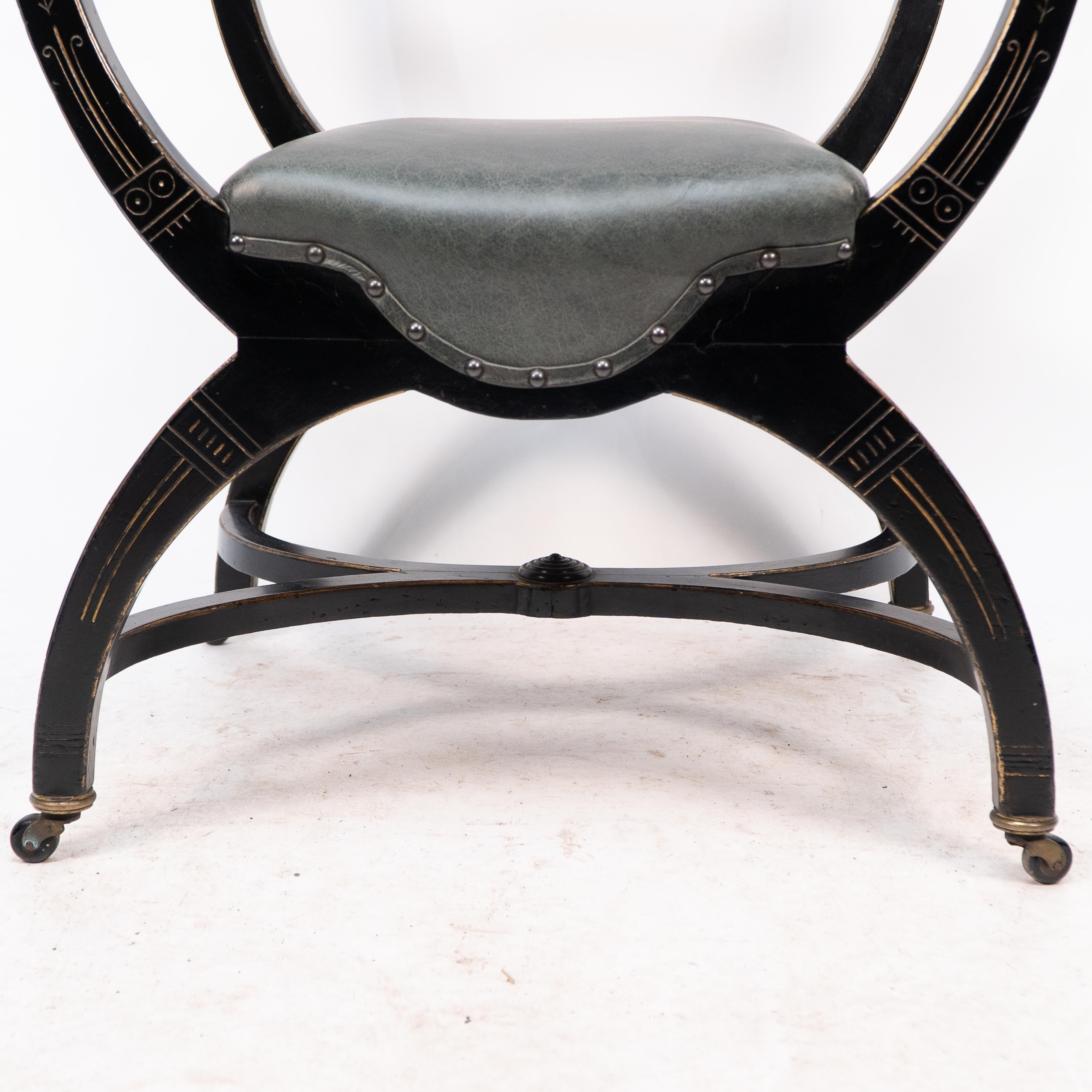 Richard Charles Aesthetic Movement Ebonised Elbow Chair with X Frame stretcher For Sale 2