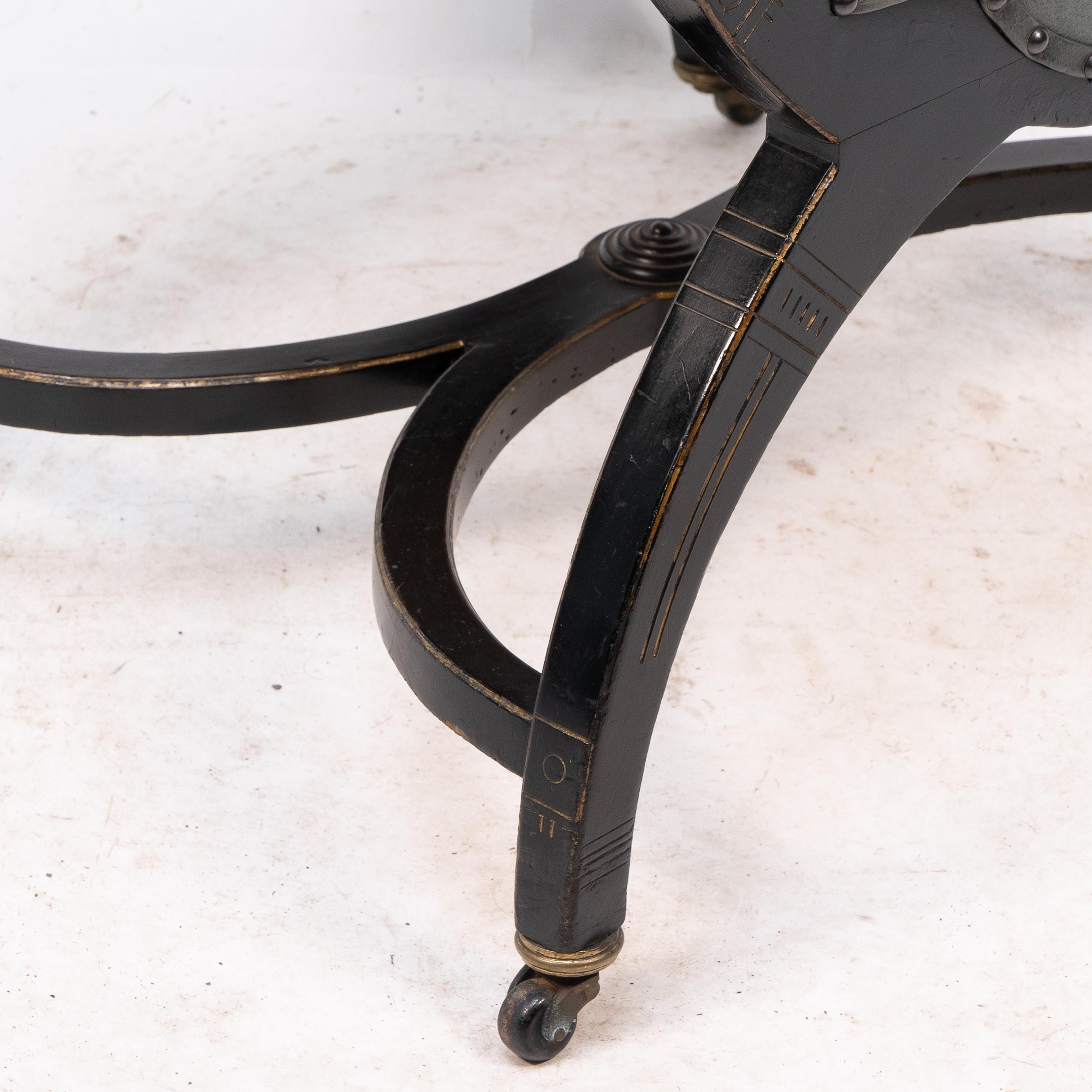Richard Charles Aesthetic Movement Ebonised Elbow Chair with X Frame stretcher For Sale 3