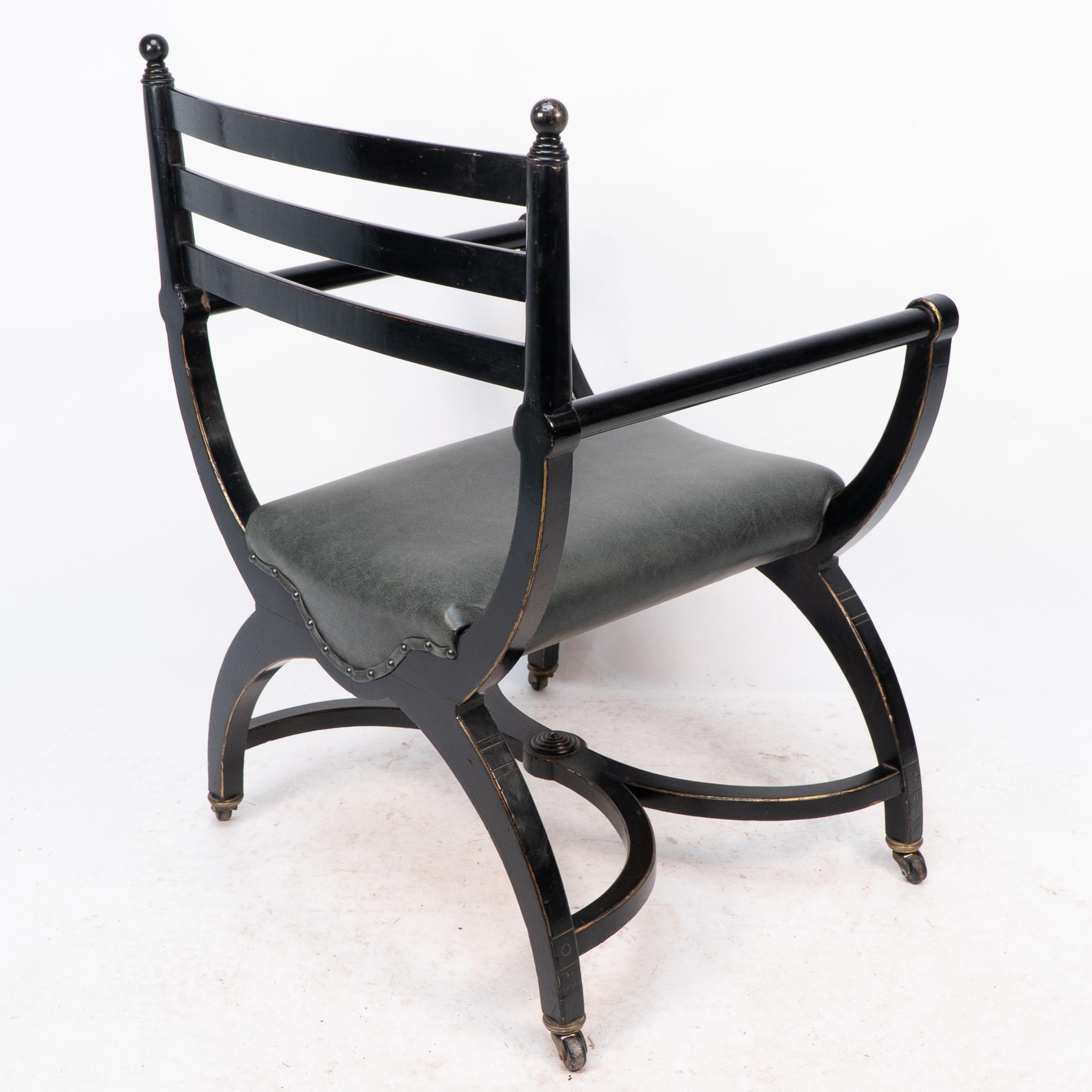 Richard Charles Aesthetic Movement Ebonised Elbow Chair with X Frame stretcher For Sale 7