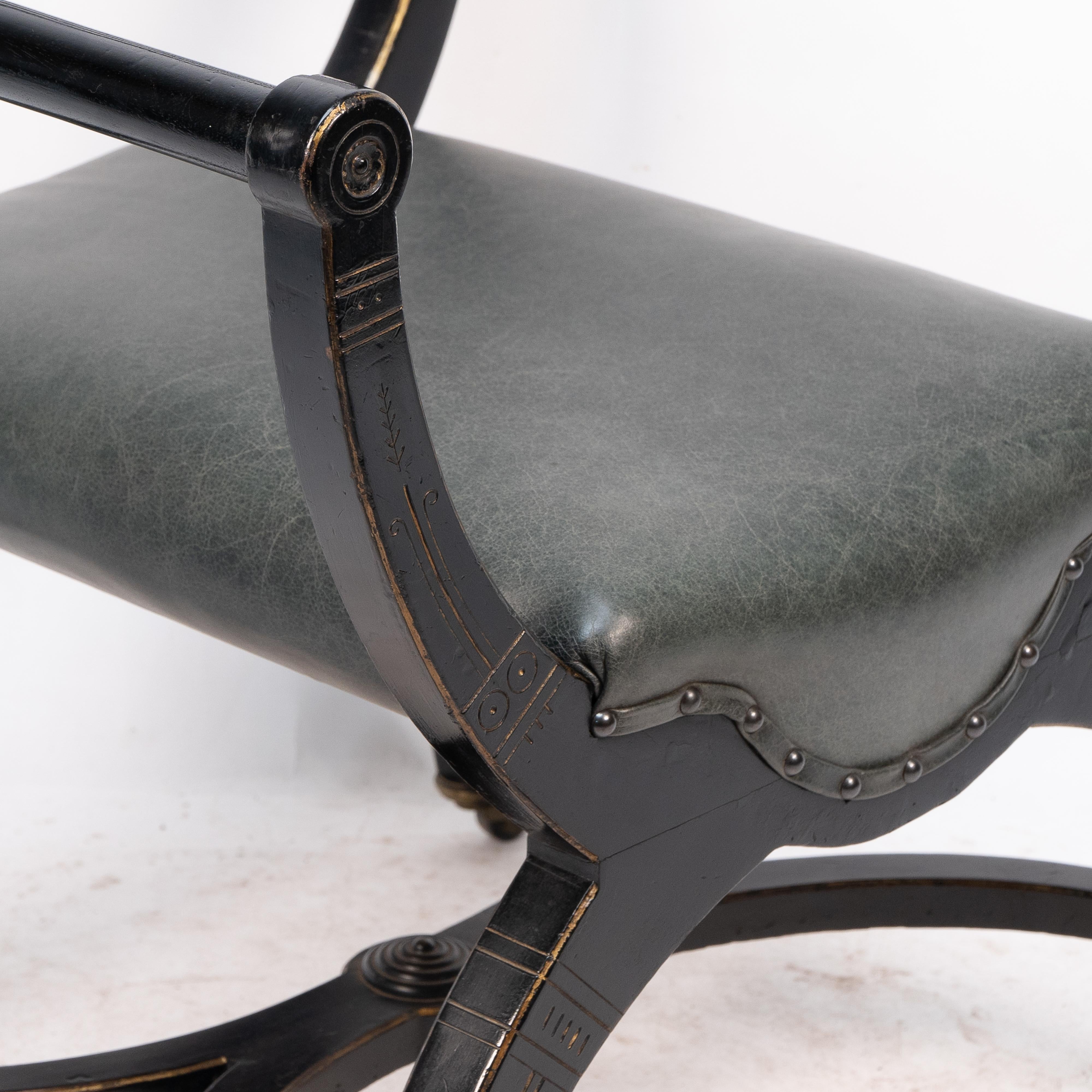 Richard Charles Aesthetic Movement Ebonised Elbow Chair with X Frame stretcher In Good Condition For Sale In London, GB