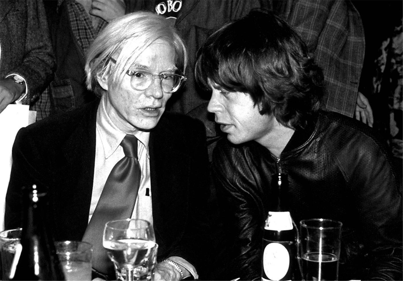 Richard E. Aaron Black and White Photograph - Andy Warhol and Mick Jagger, NYC, 1977