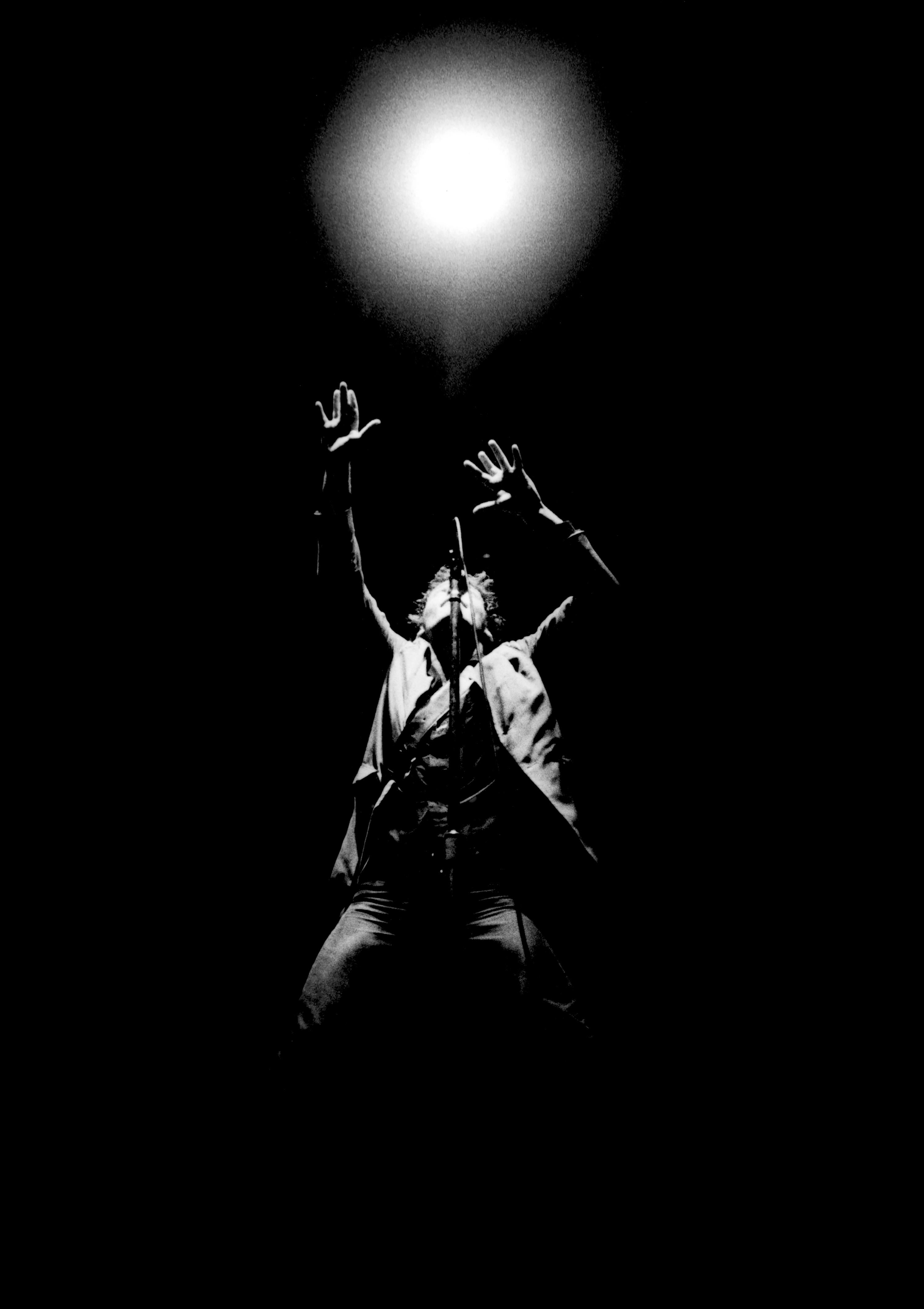 Richard E. Aaron Black and White Photograph - Bruce Springsteen 1980 Black and White Concert Light