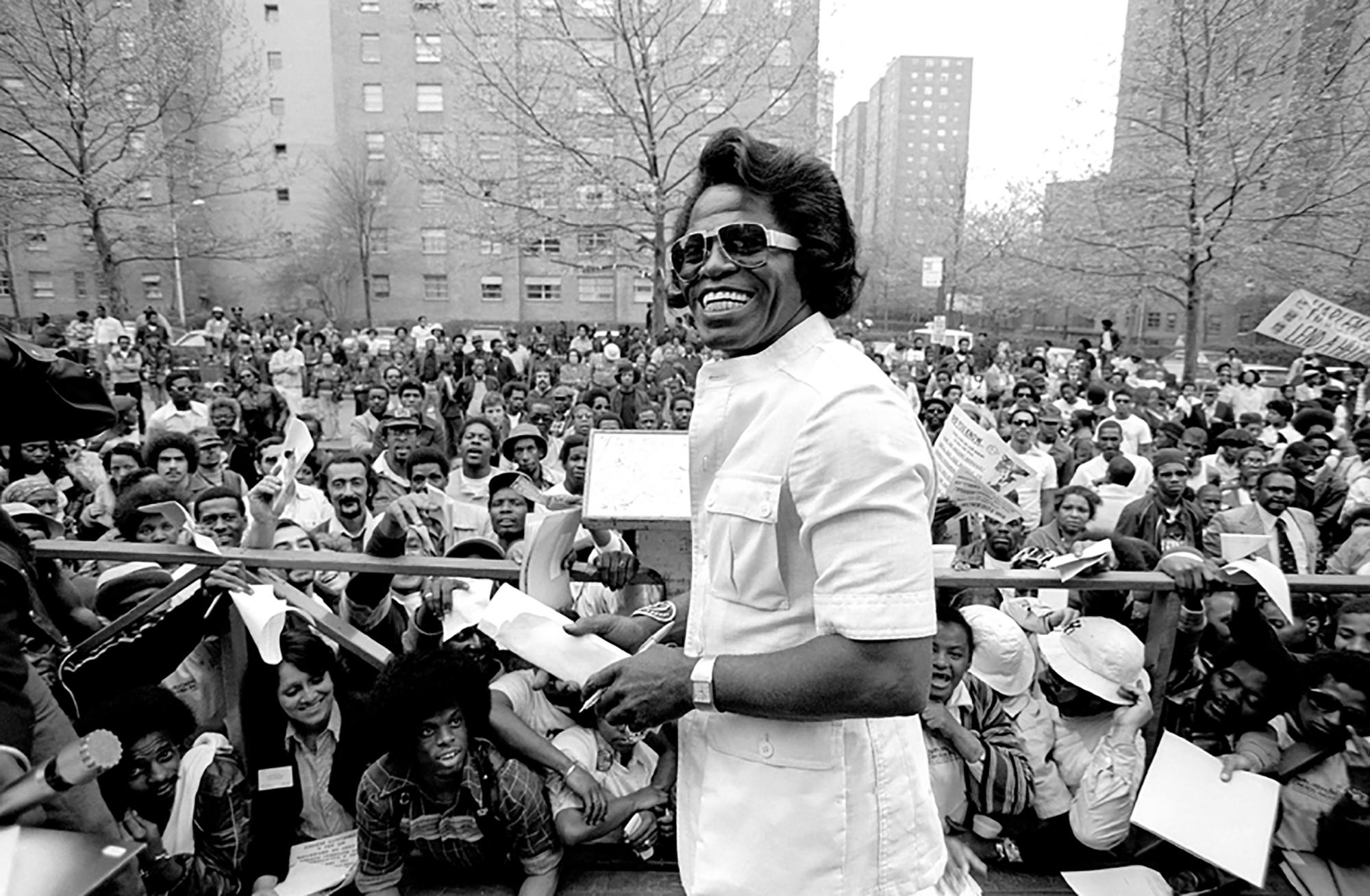 Richard E. Aaron Black and White Photograph - James Brown in Harlem Smiling in Hi Resolution on Hahnemuehle Paper