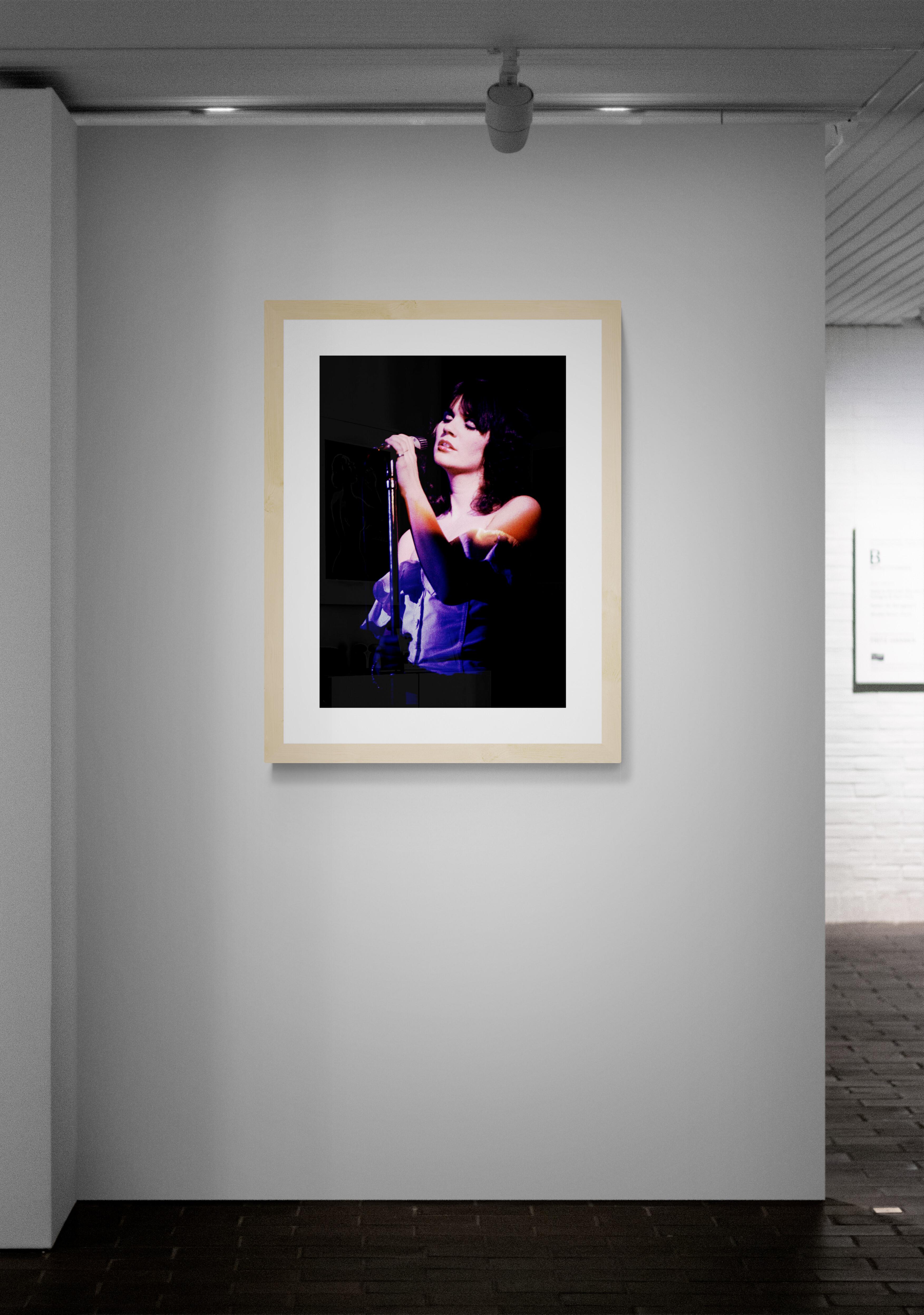 Title: Linda Ronstadt #7 Concert Photo
Artist: Richard E. Aaron
Estate Edition: Hand numbered with estate chop mark in the margin, signature stamp on verso, archival pigment print on Hahnemühle Photo Rag Pearl, 100% cotton paper fine art paper.