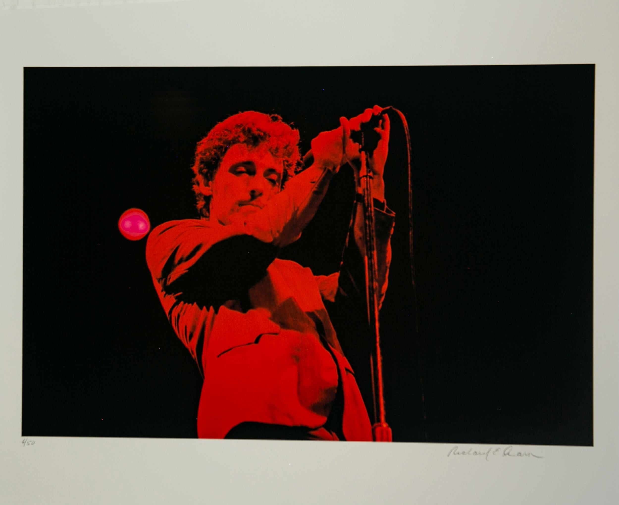 Richard E. Aaron Color Photograph - Springsteen in Red on Hahnemuehle Paper