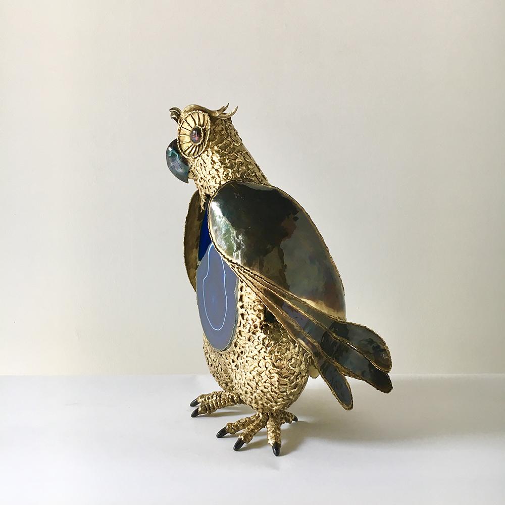 Unique French welded and hammered brass sculptural lamp in the form of an owl with blue agate slice concealing the light in the stomach by Richard Faure 1980s etched signature on body.
 