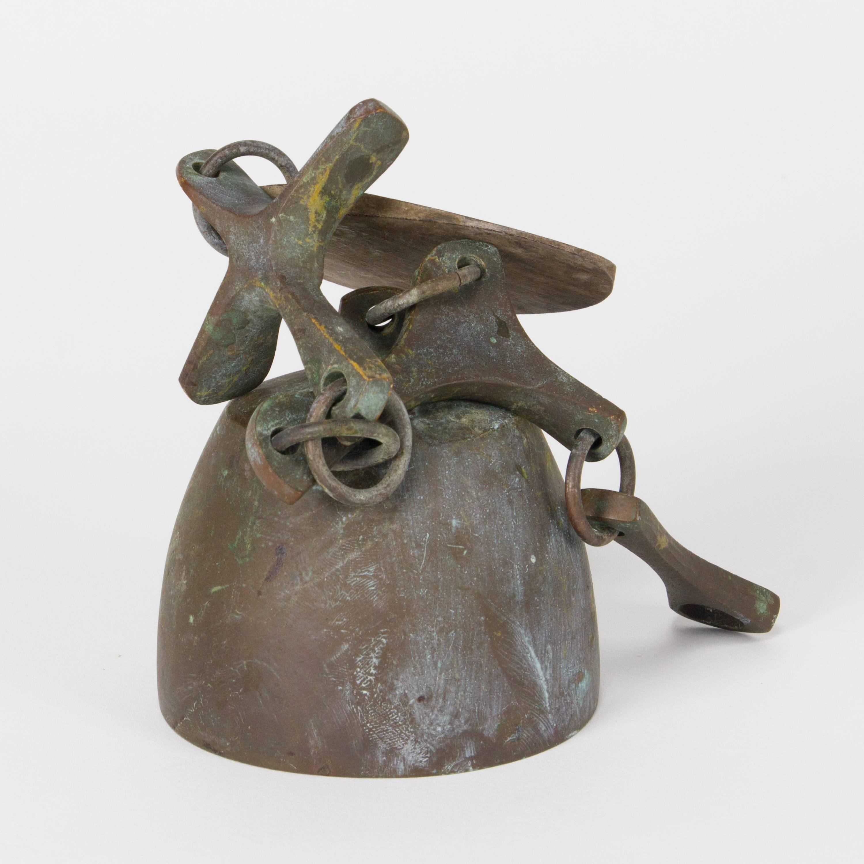 Early cast-bronze wind bell by Richard Fisher for US Bells, with wood wind catcher.
 