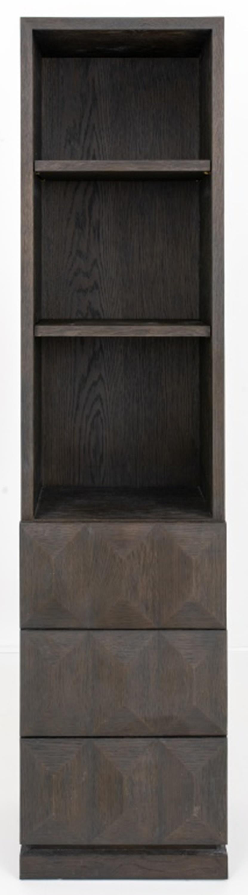 Richard Forwood (British, XX)  for Restoration Hardware 'Geometric' bookcase (designed 2016)  in American oak, with two moveable shelves above three short drawers.   

Dimensions: 84