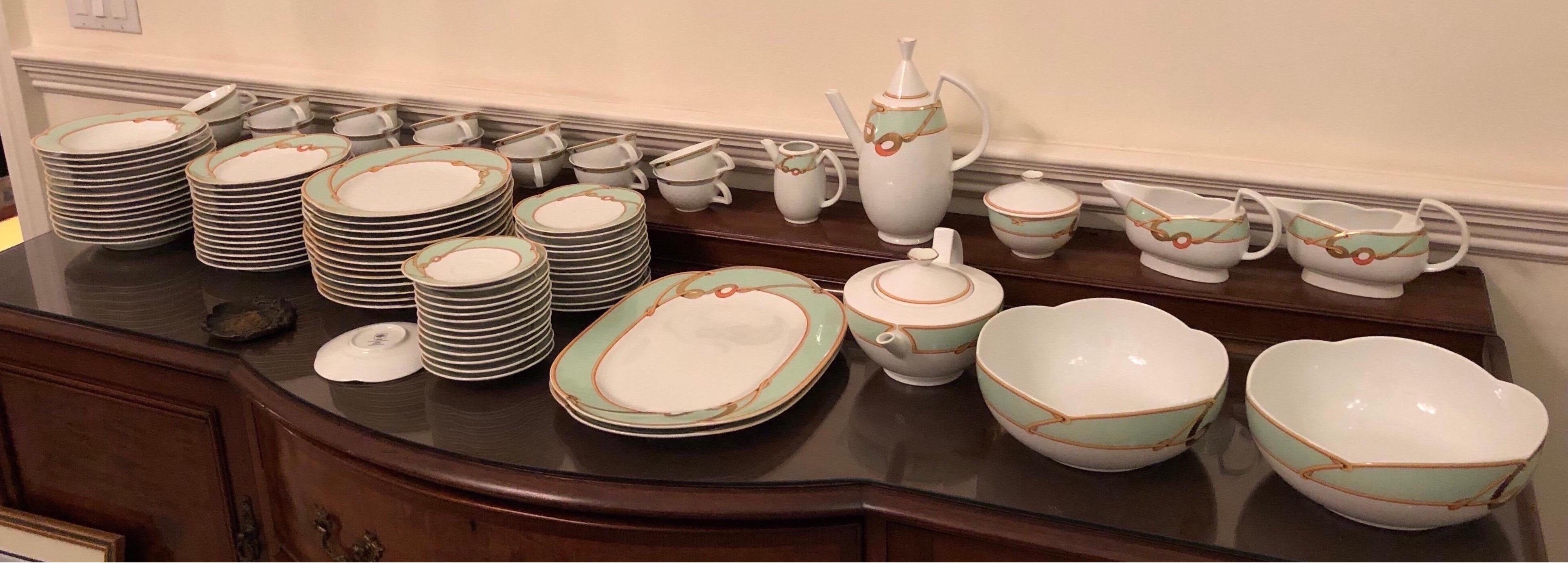 Richard Ginori 105 Piece Porcelain with Light Green Band and Gold Ropes
7 Piece Place Settings To include.. Coffee Pot, Tea Pot, Cream and Sugar…Two Platters Two Open Serving Dishes..Two Gravy Boats…13 Dinner..14 Lunch..14 Soup 12 Salad..14 Bread &