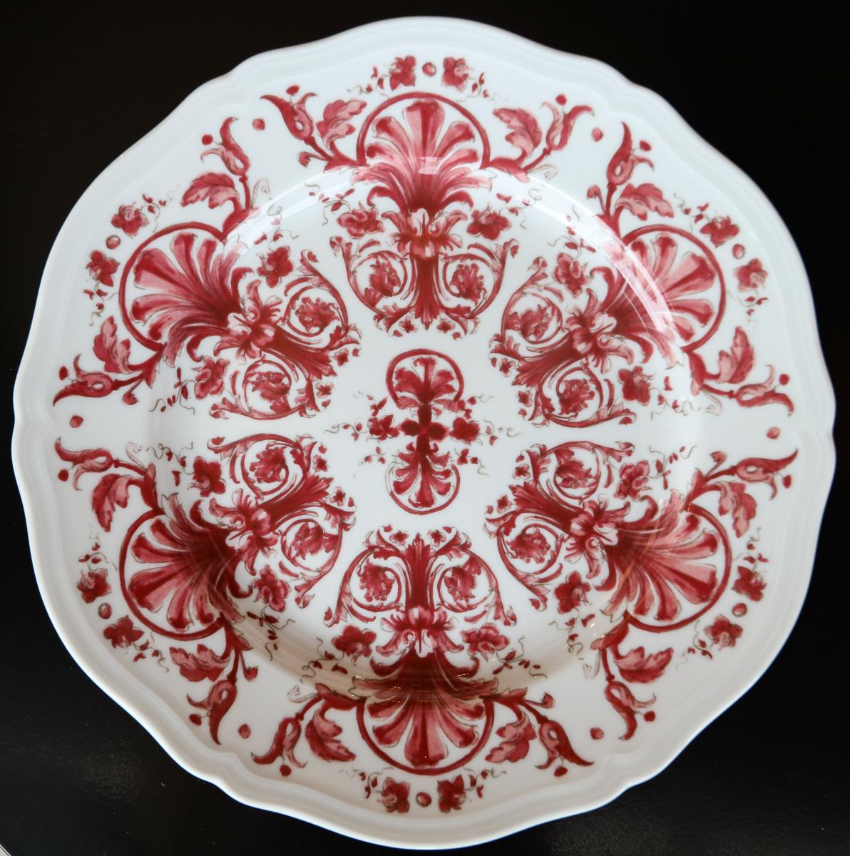 Richard Ginori babele Rosso red dinner plate in the Antico Doccia shape, measures 26.5cm in diameter.

