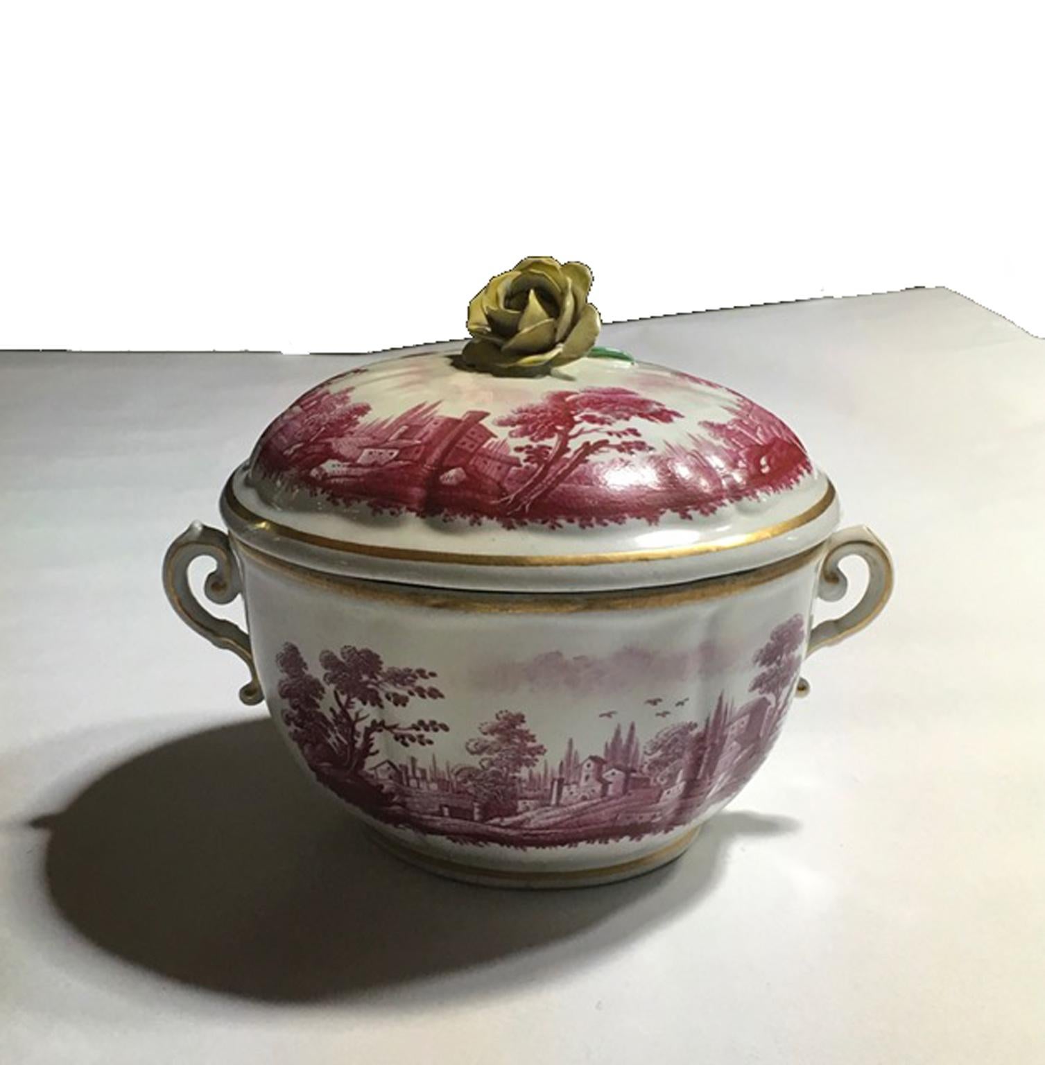 Italian Richard Ginori mid-18th century porcelain covered cup or little covered sauce tureen painted with landscapes in fuchsia color

This beautiful covered cup it was hand painted in the Flemish style, with its Italian countryside landscapes