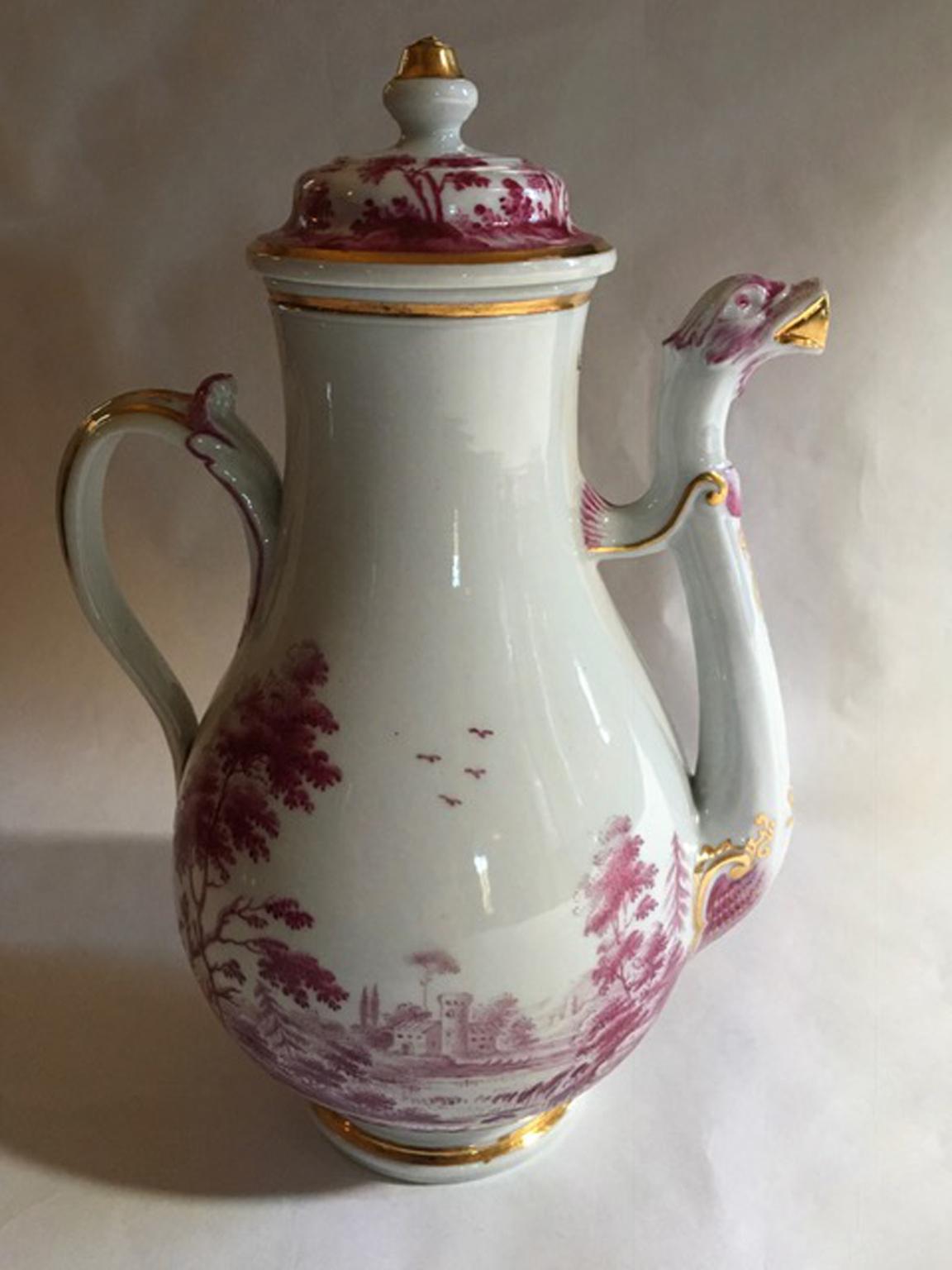 Richard Ginori Mid-19th Century porcelain tea pot with landscapes drawings in pink, hand made in Italy.

This handmade tea pot in fine porcelain was made by Richard Ginori, in Doccia, Italy.
The piece is hand painted in pink with landscapes so rich