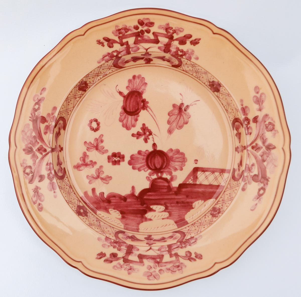 Richard Ginori Oriente Italiano vermiglio peach dessert plate in the Antico Doccia shape 21cm in diameter.


