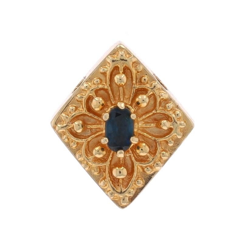 Brand: Richard Glatter
Era: Vintage

Metal Content: 14k Yellow Gold

Stone Information

Natural Sapphire
Treatment: Heating
Carat(s): .35ct
Cut: Oval
Color: Blue

Total Carats: .35ct

Style: Slide Charm
Theme: Floral Medallion

Measurements

Tall: