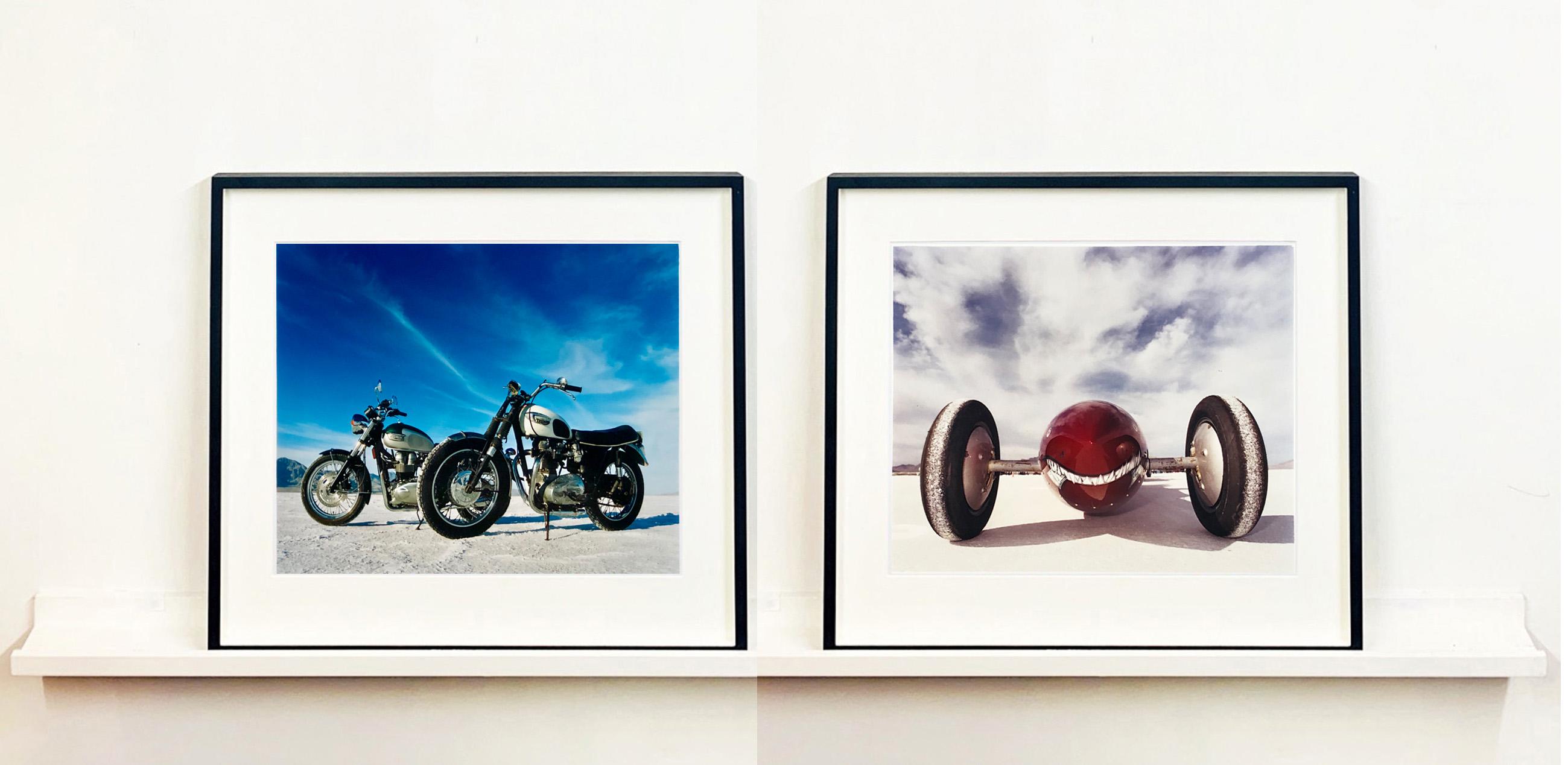 Two Bonnerville Motorcycles, captured in the iconic home of speed, Bonneville Salt Flats. Set against the bold blue sky in Utah.

This artwork is a limited edition of 25 gloss photographic print made in the artist's darkroom. It is signed and