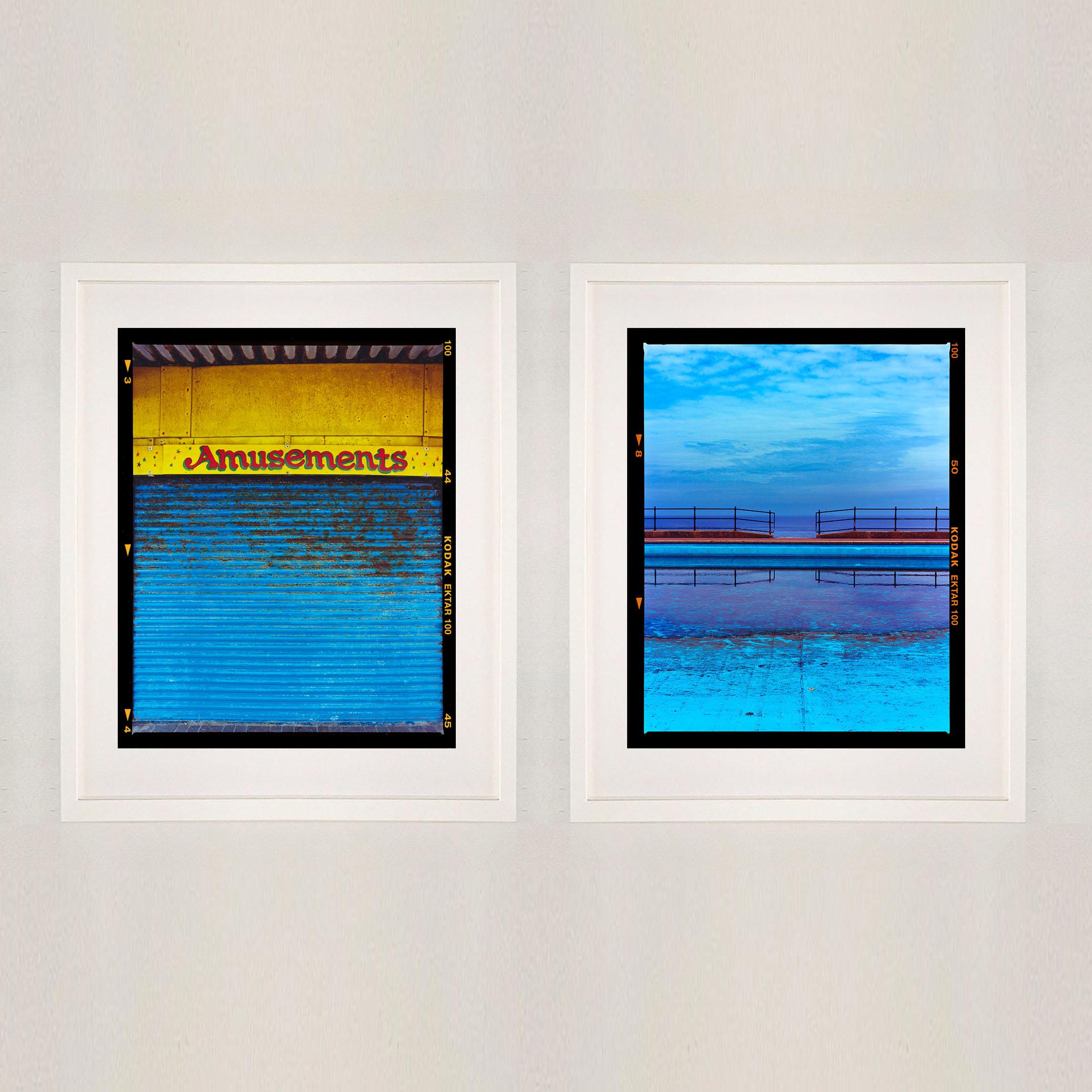 Amusements, Porthcawl – Typografiefotografie am Meer (Blau), Color Photograph, von Richard Heeps