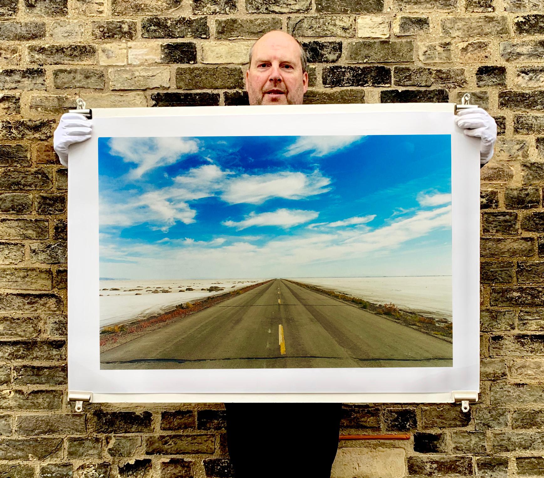 Approach Road to Bonneville Salt Flats.
The iconic photograph of an open road in America, leading to the famous Bonneville Speedway.

This artwork is a limited edition of 25, gloss photographic print, dry-mounted to aluminium, it is presented in a