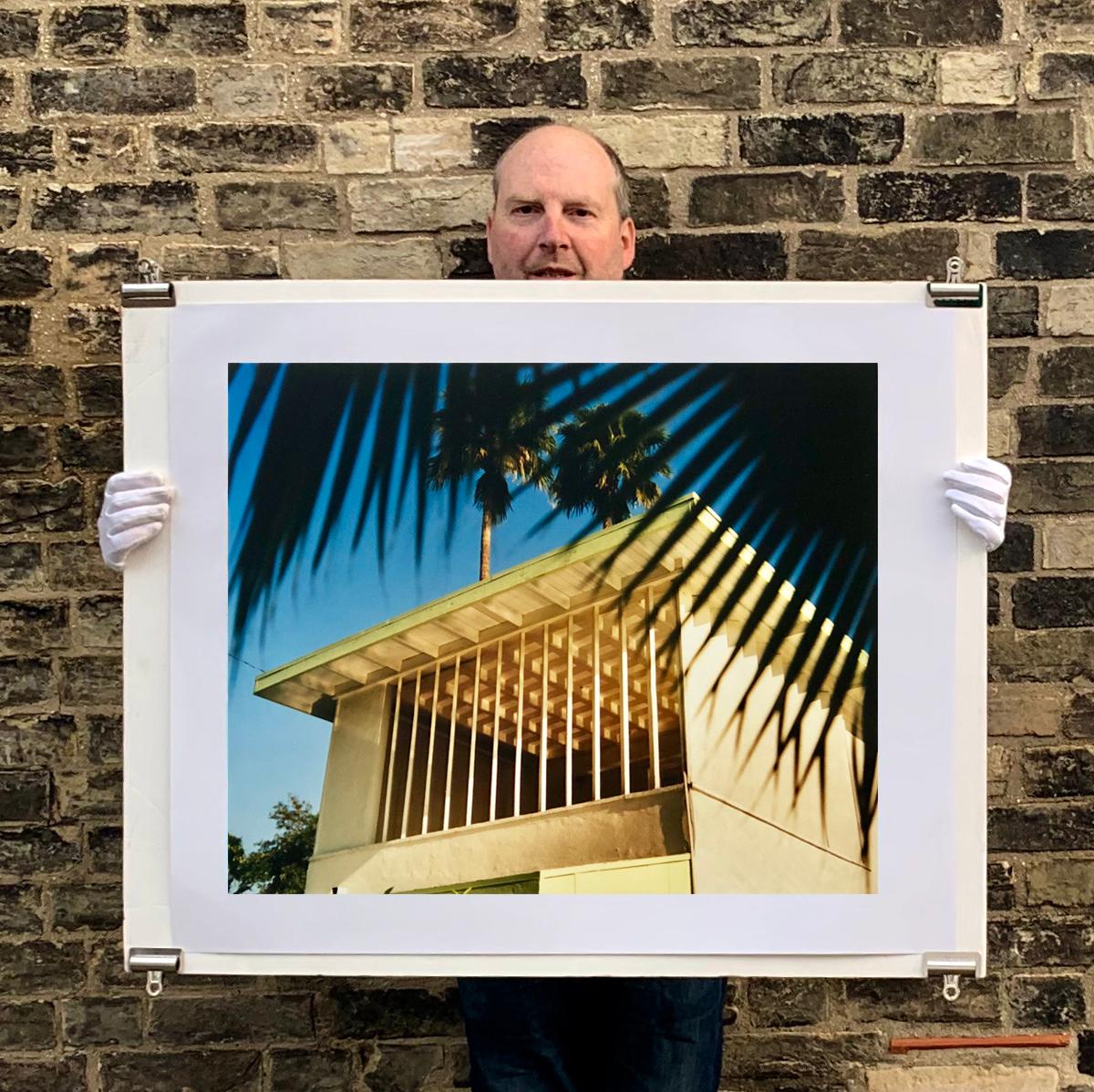 'Ballantines Movie Colony', part of Richard Heeps 'Dream in Colour' Series. Here he perfectly captures Palm Springs mid-century modern architecture and the desert oasis it is in this palm print.

This artwork is a limited edition of 25, gloss