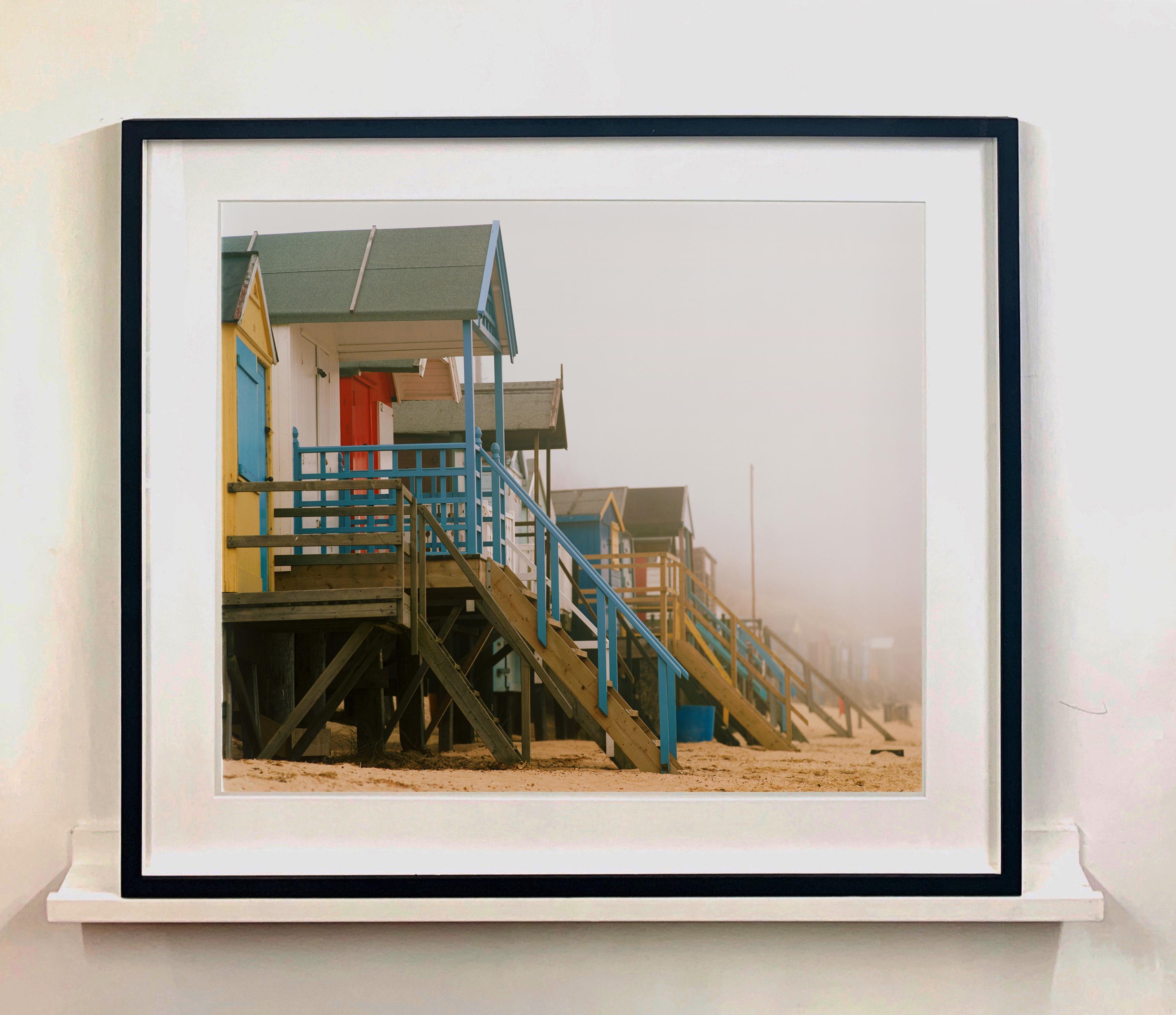 Beach Huts, Wells-next-the-Sea, Norfolk - British seaside color photography - Photograph by Richard Heeps