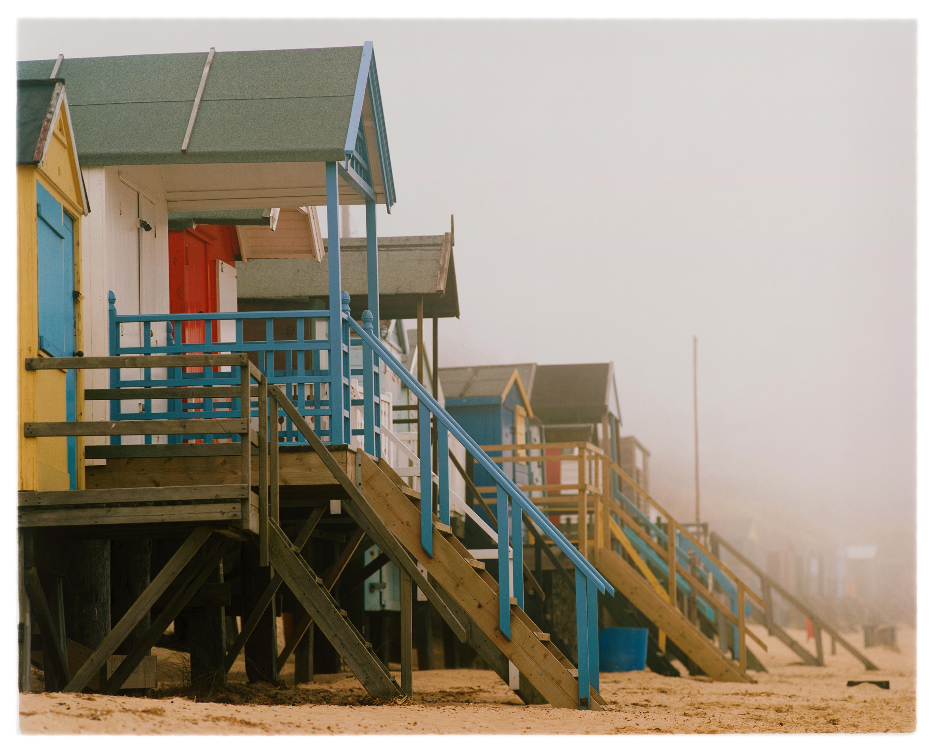 Richard Heeps Landscape Photograph - Beach Huts, Wells-next-the-Sea, Norfolk - British seaside color photography