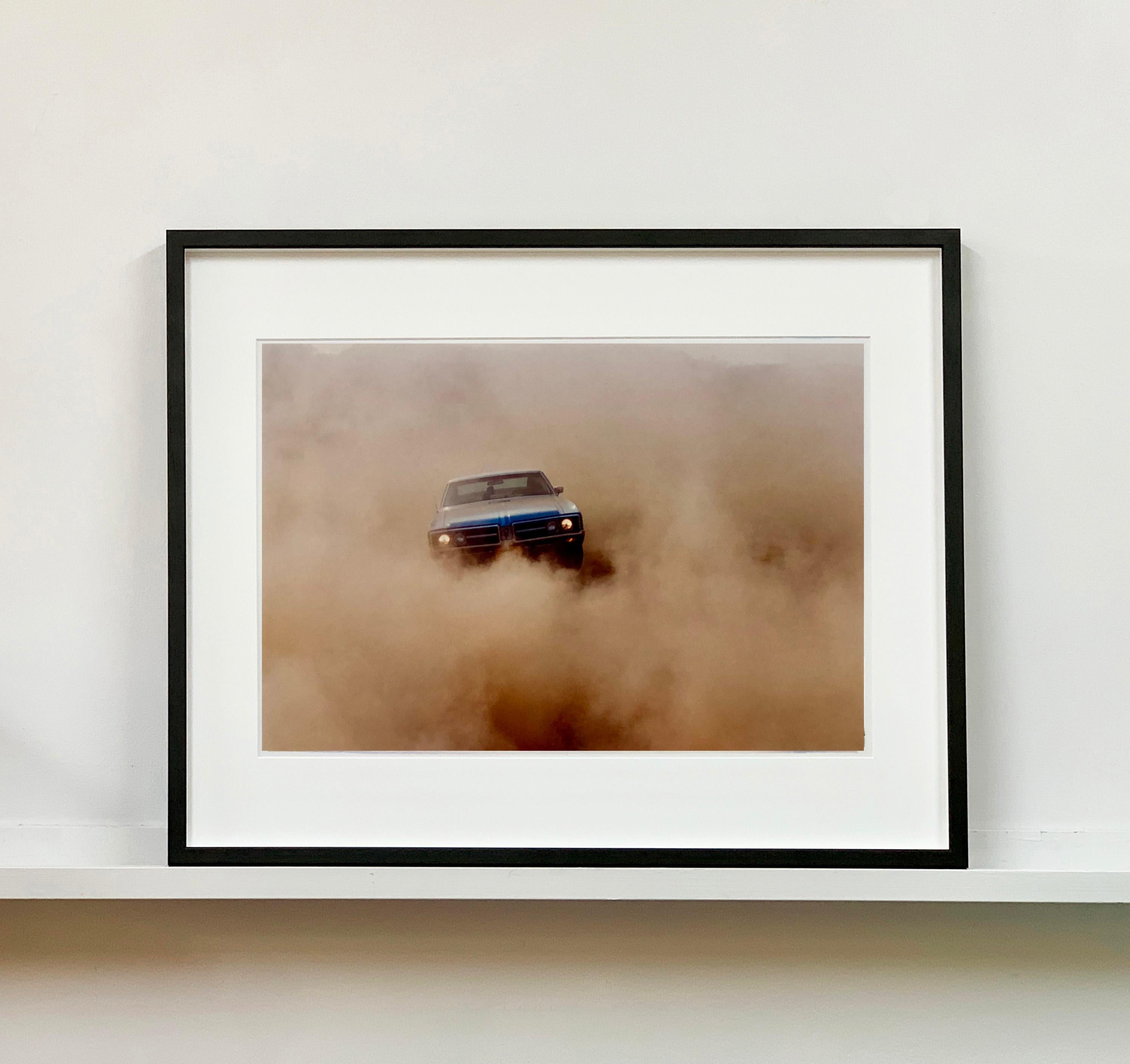 'Buick in the Dust II', features an American Car, on a British Beach (Hemsby, Norfolk) driven by a German. Richard spent years honing his skills as a drag racing photographer, a sport he loves which lead his photography career on some amazing