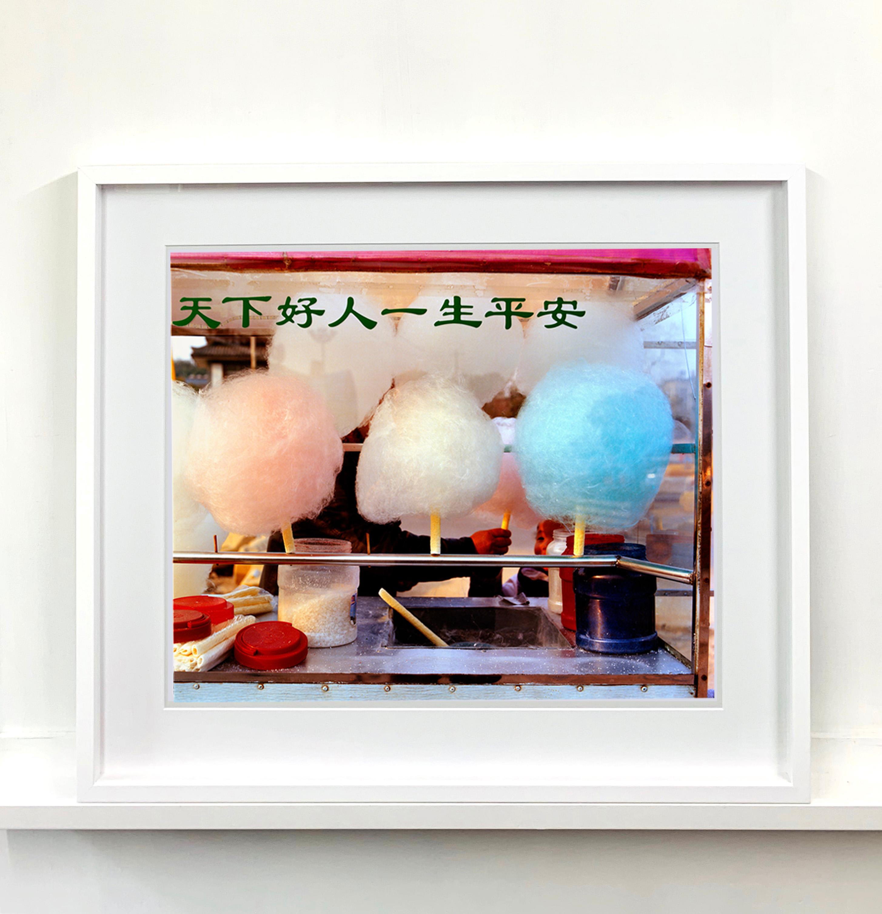 'Candy Floss' taken by Richard Heeps when travelling in china. The pops of color, the pinks and blues and the layers of detail draw you in. The Chinese Writing does not say Candy Floss/Cotton Candy for sale as you might expect, it says something