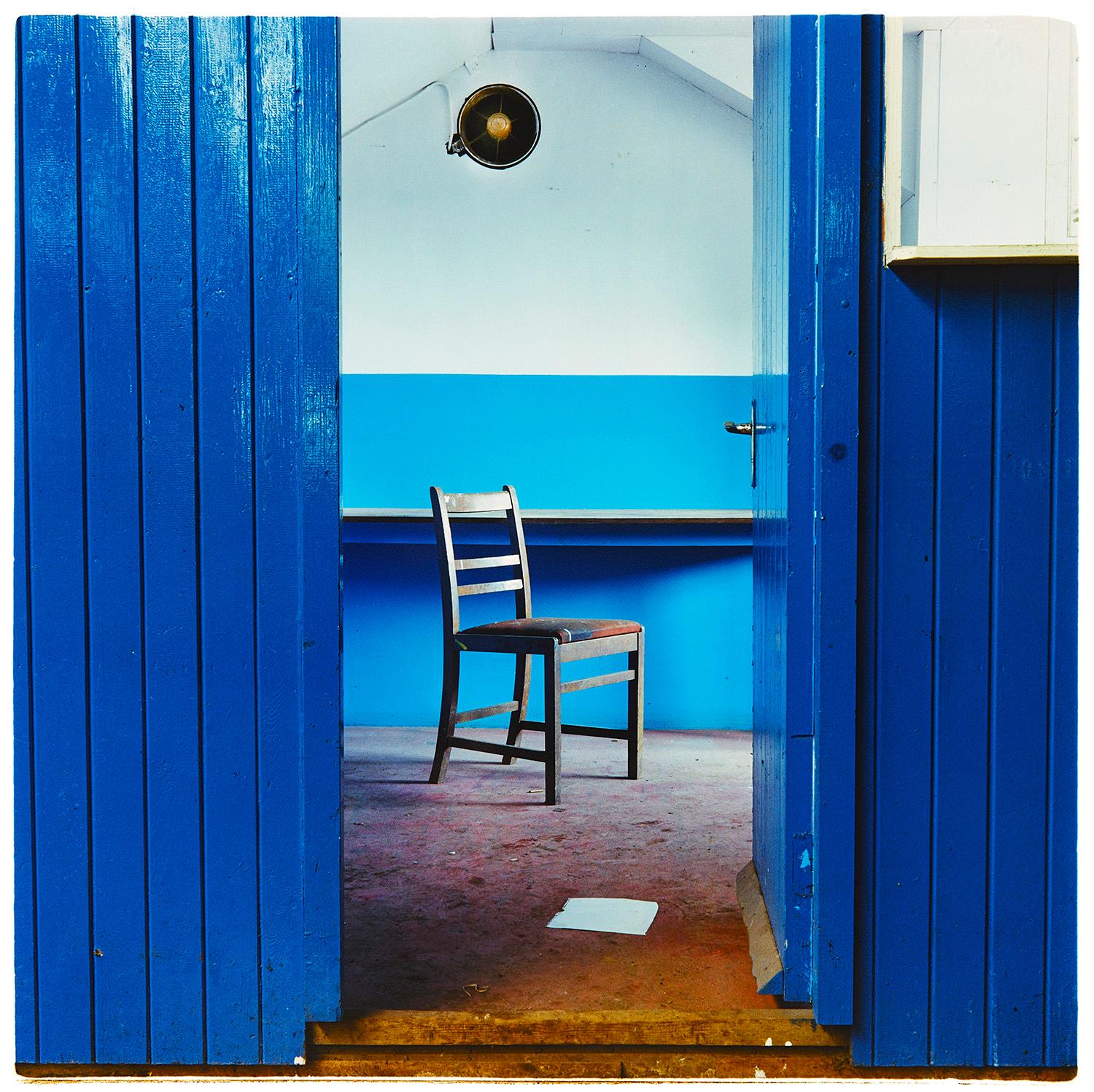 Richard Heeps Interior Print - Chair, Northwich - Blue industrial interior photography