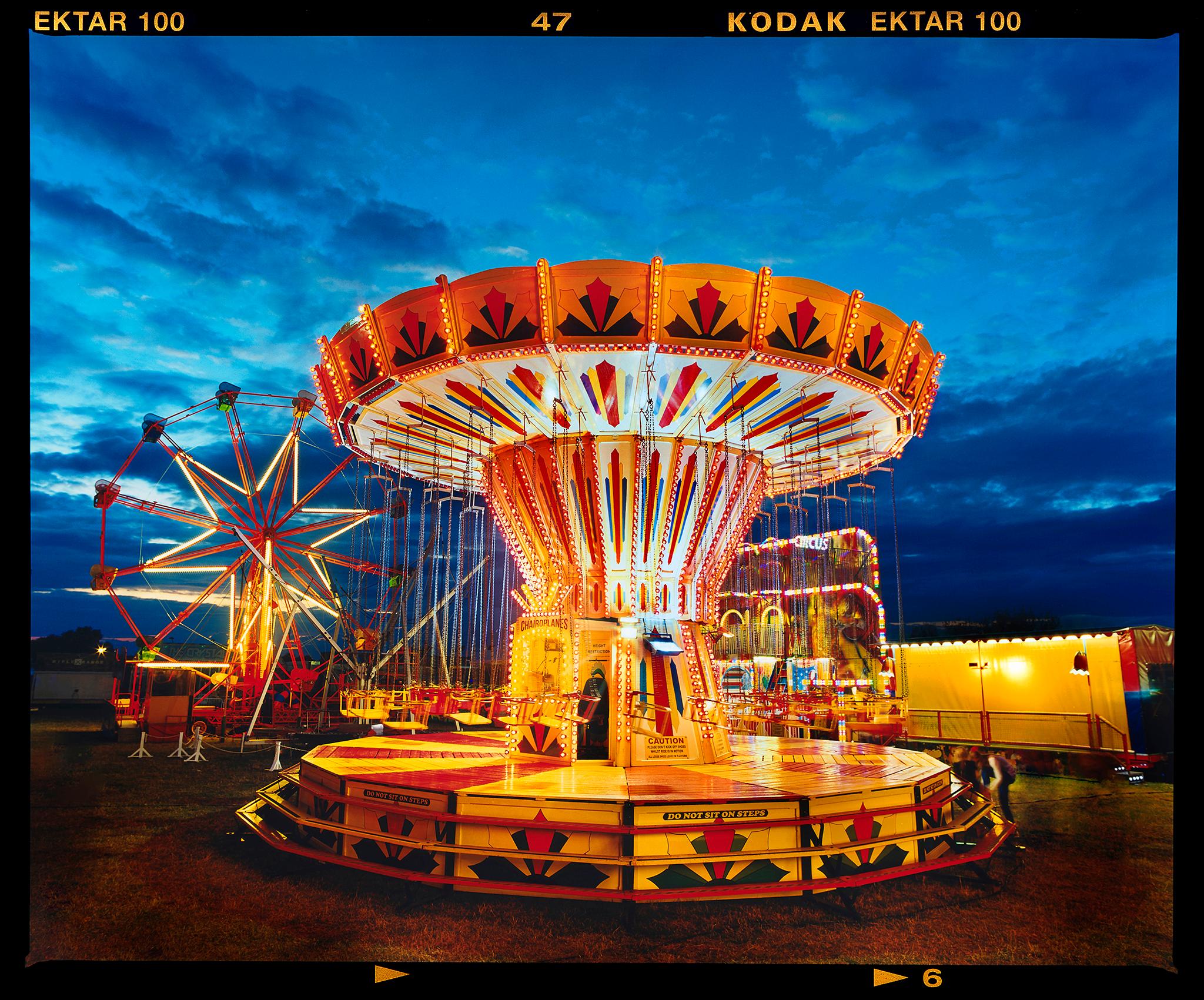 Richard Heeps Landscape Photograph - Chairoplanes, Haddenham Steam Rally, Cambridgeshire - Vintage Fairground Photo