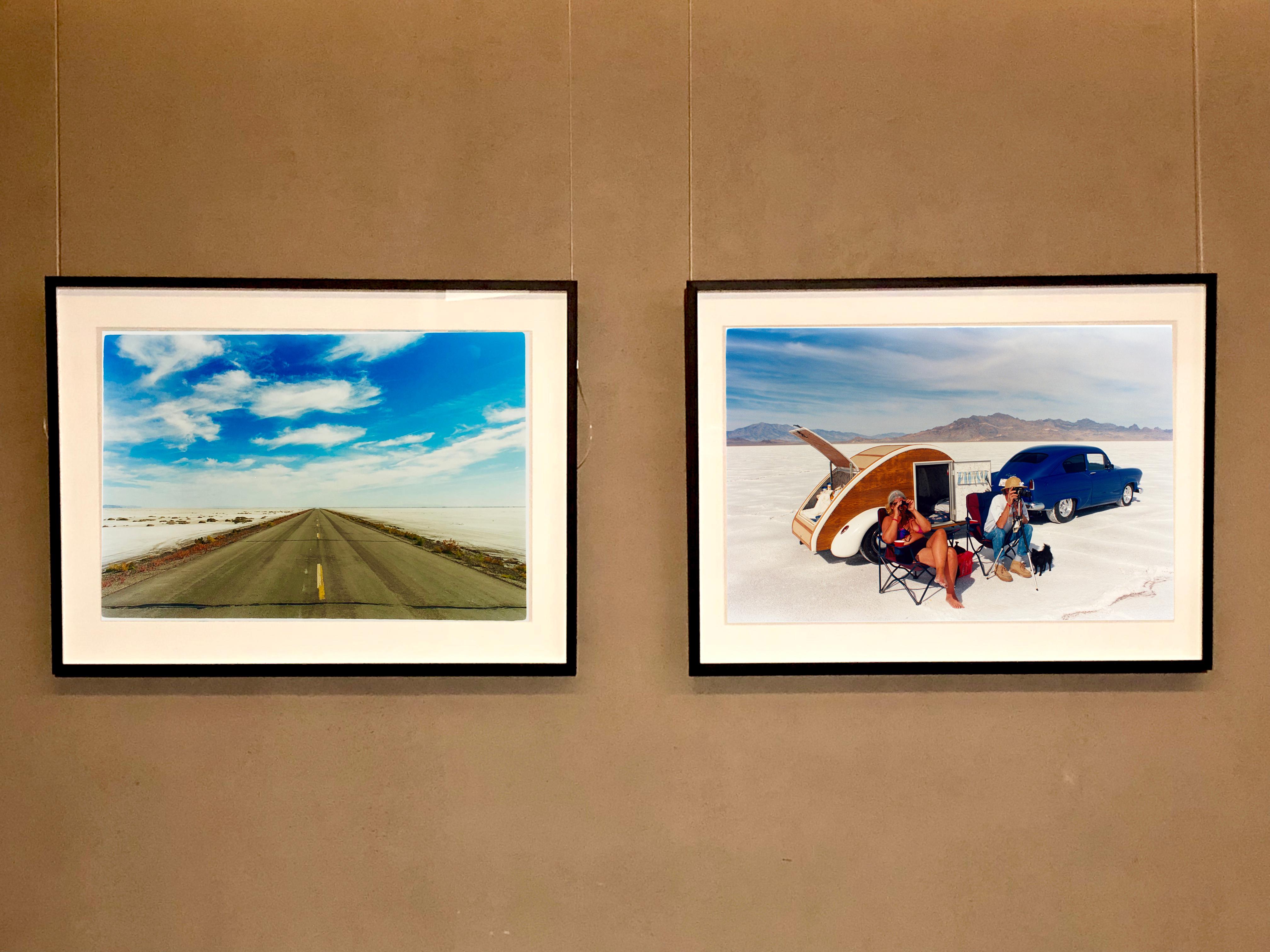 Christine's '52 Henry J & Teardrop Caravan, photograph by Richard Heeps, captured in the iconic home of speed, Bonneville Salt Flats. Just as the mountains contrast with the flatness, these super cool retro lifestyle spectators look on the