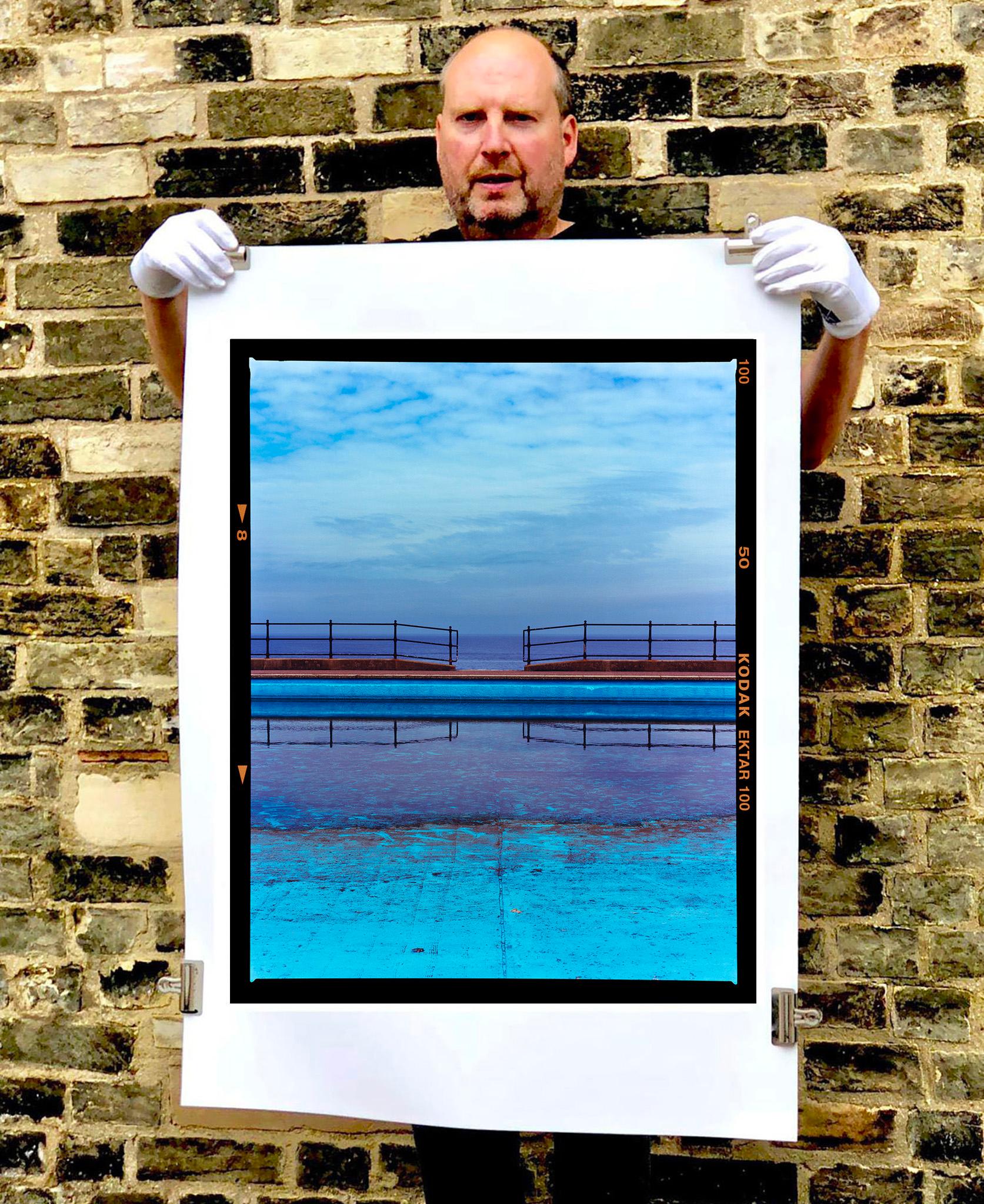 Craig y Don Pool, Llandudno Beach, Wales - Blue British Swimming Pool Sea Photo - Photograph by Richard Heeps