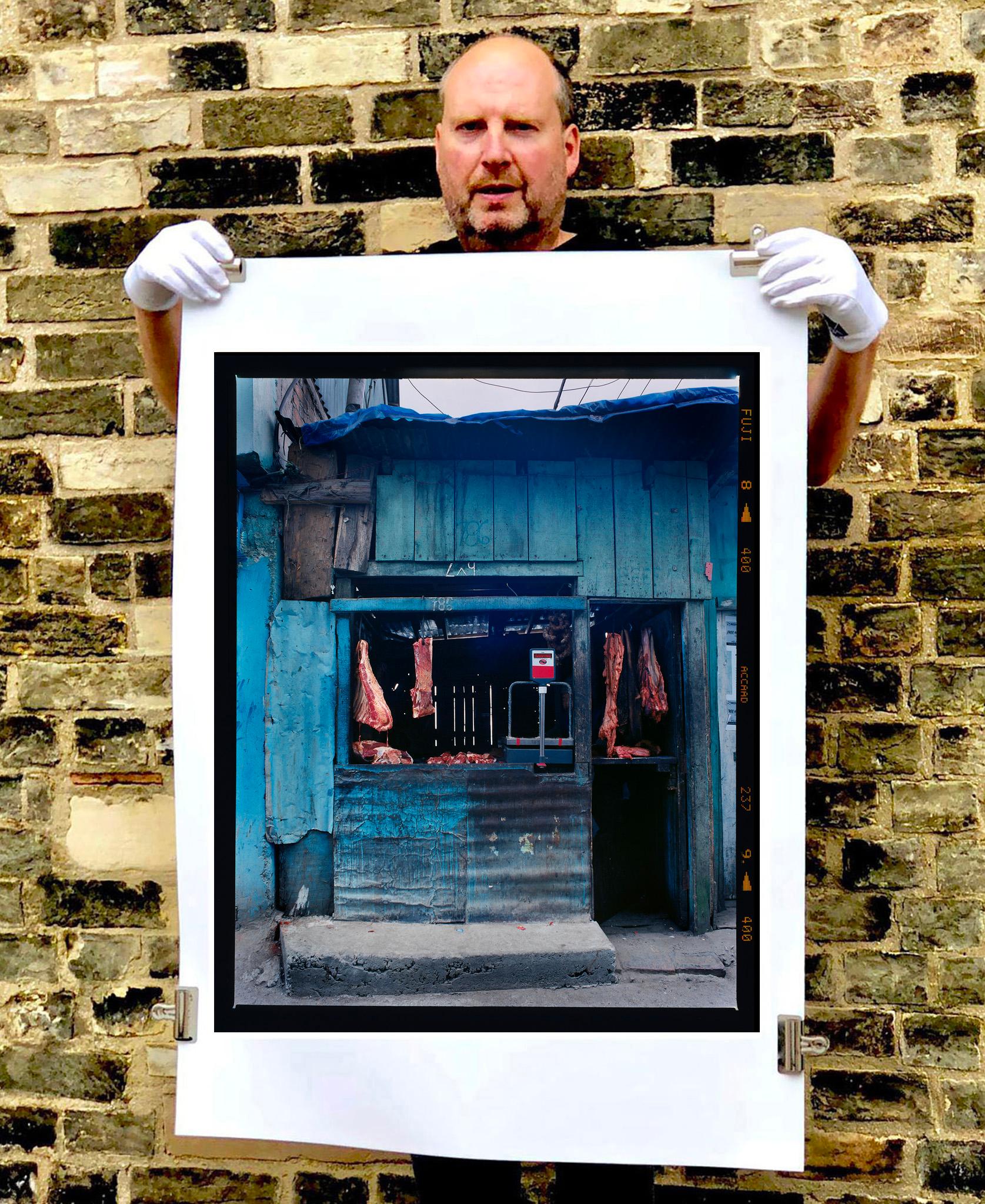 Darjeeling Butchers, street photography on Richard Heeps' journey in India, a pilgrimage from Kerala in the South, to his Grandfather's birthplace Meerut in the North. One of a number of 'butchers' Richard has photographed, perfectly capturing the