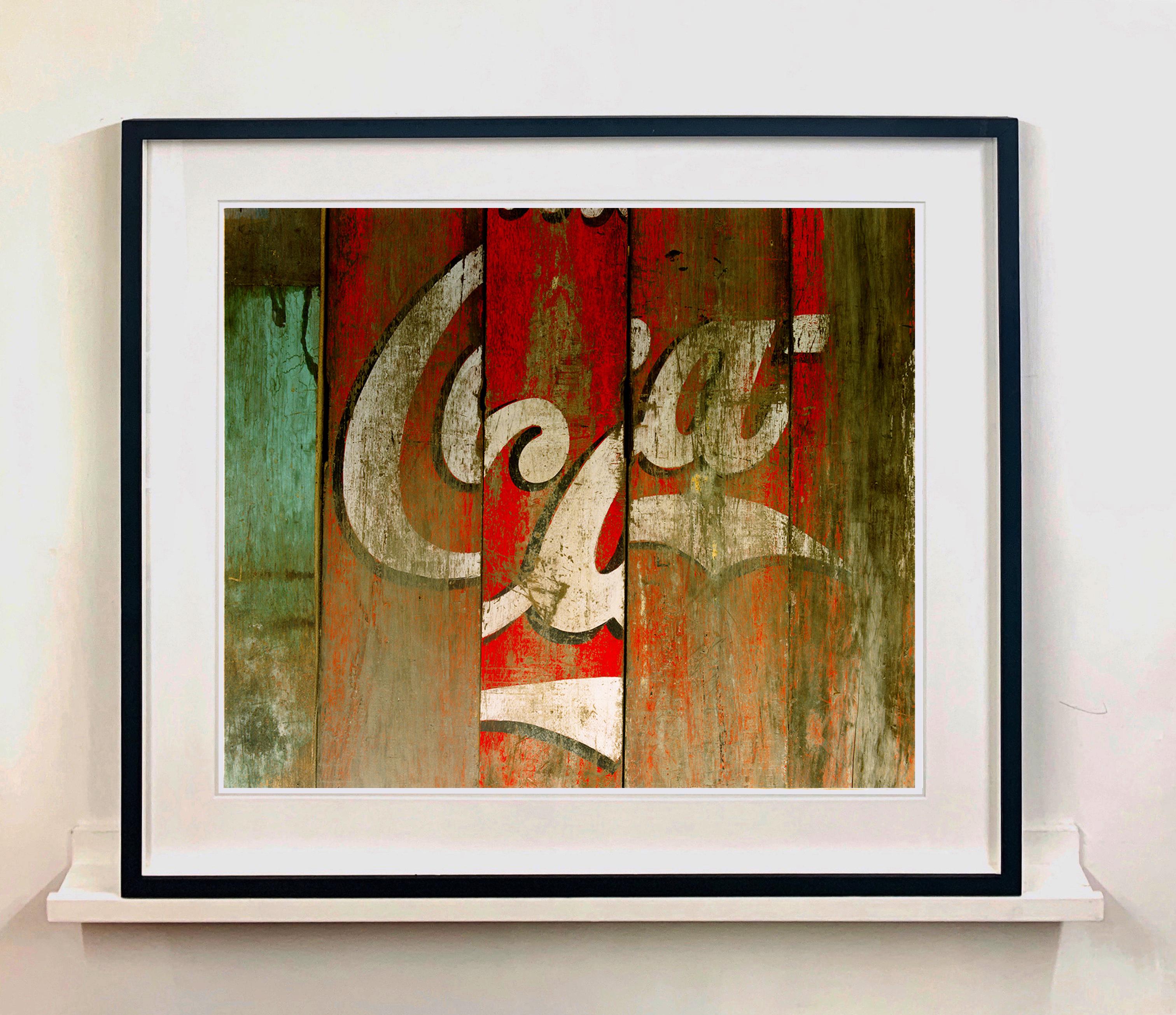 Disjointed Coca-Cola, Darjeeling, West Bengal - Contemporary Color Photography - Print by Richard Heeps