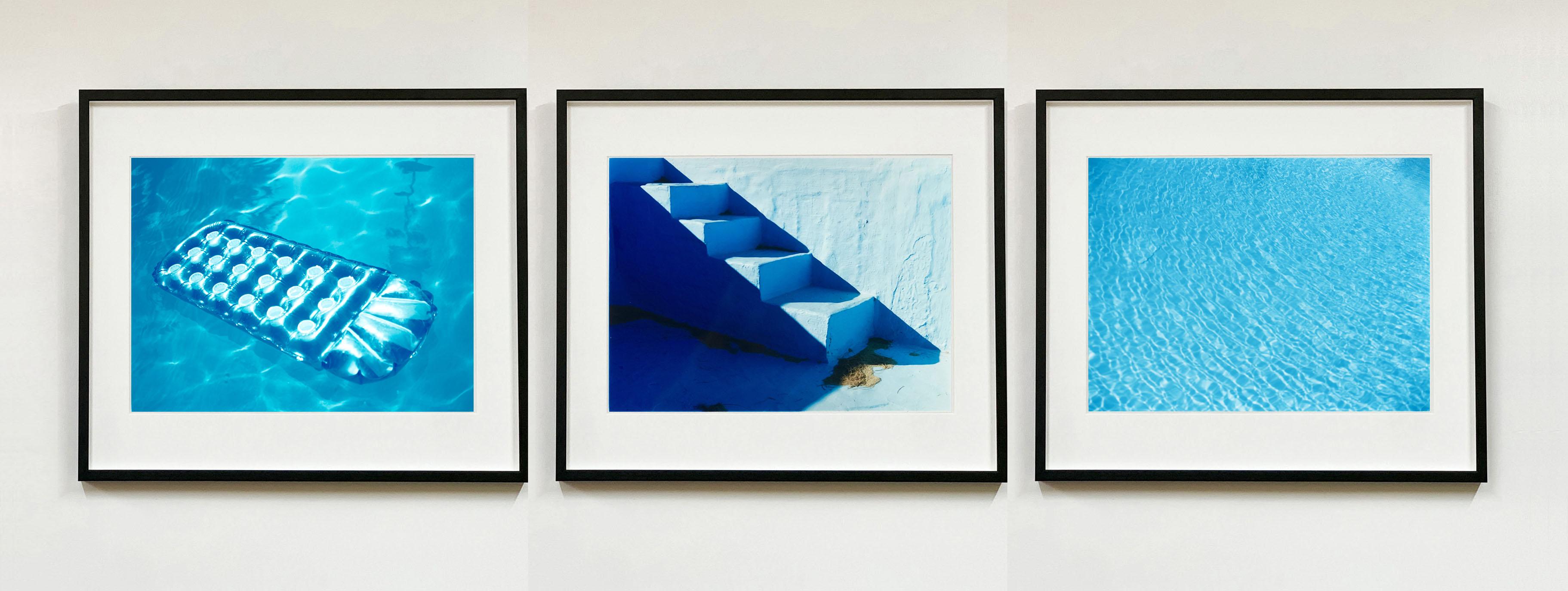 Richard Heeps Dream in Color Swimming Pool Artworks.
A set of three individual artworks, vibrant yet serene they take you to the swimming pool on a hot day.
Featuring, 'Sun Lounger, Palm Springs, California, 2002', 'Steps, California, 2002' and