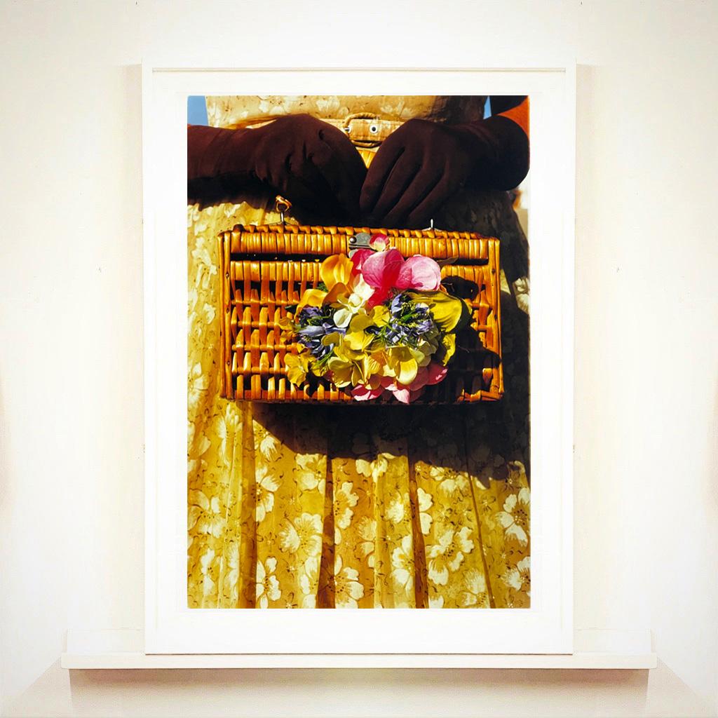 This stylish artwork, 'Floral Wicker Bag' taken at the glamorous retro event Goodwood Revival, perfectly captures feminine sophistication with a vintage vibe.

This artwork is a limited edition of 25, gloss photographic print, dry-mounted to