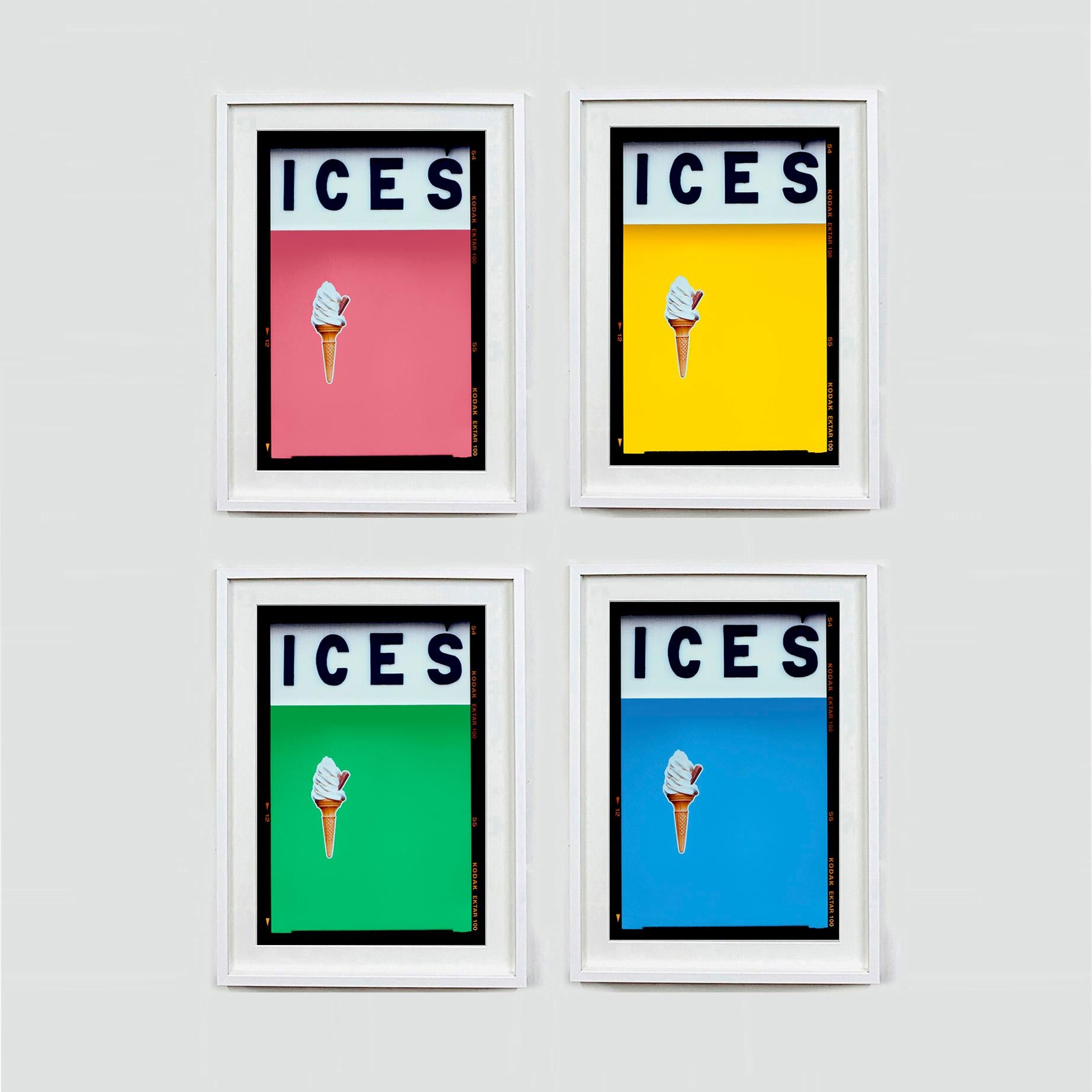 ICES, by Richard Heeps, photographed at the British Seaside at the end of summer 2020. This artwork is about evoking memories of the simple joy of days by the beach. The coral pink color blocking, typography and the surreal twist of the suspended